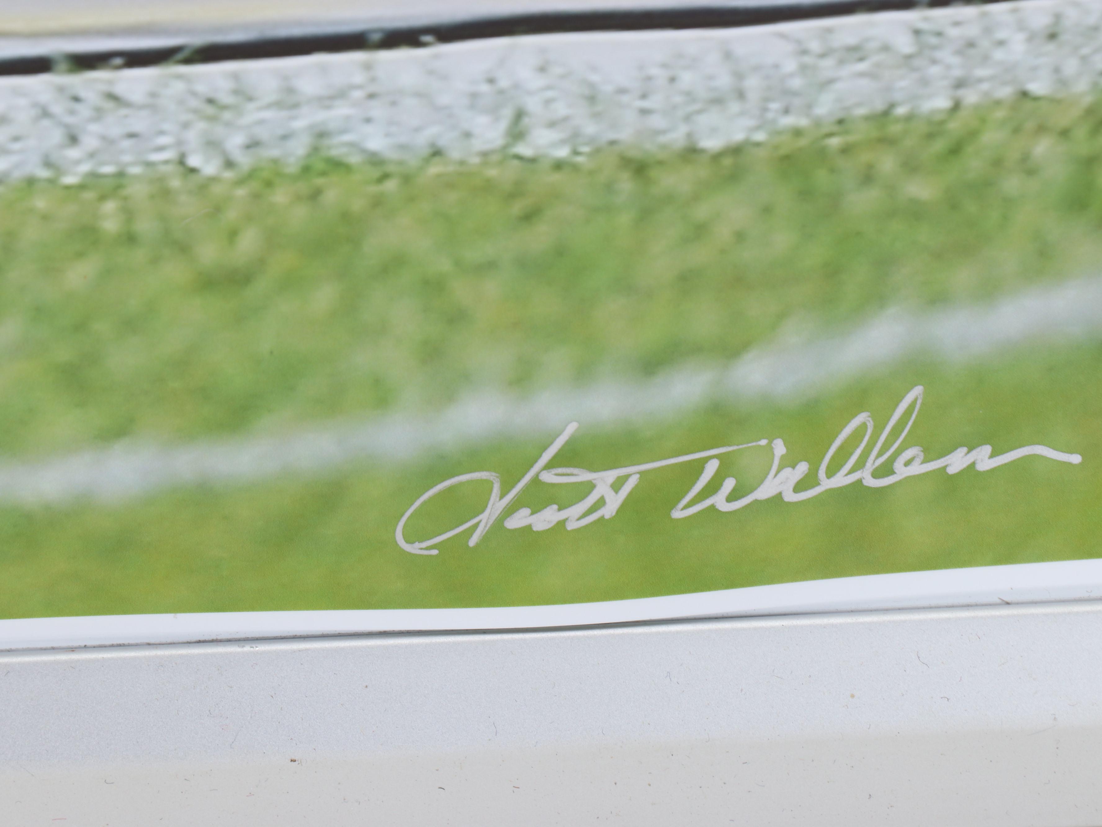 Nine NFL Photo Prints and Posters