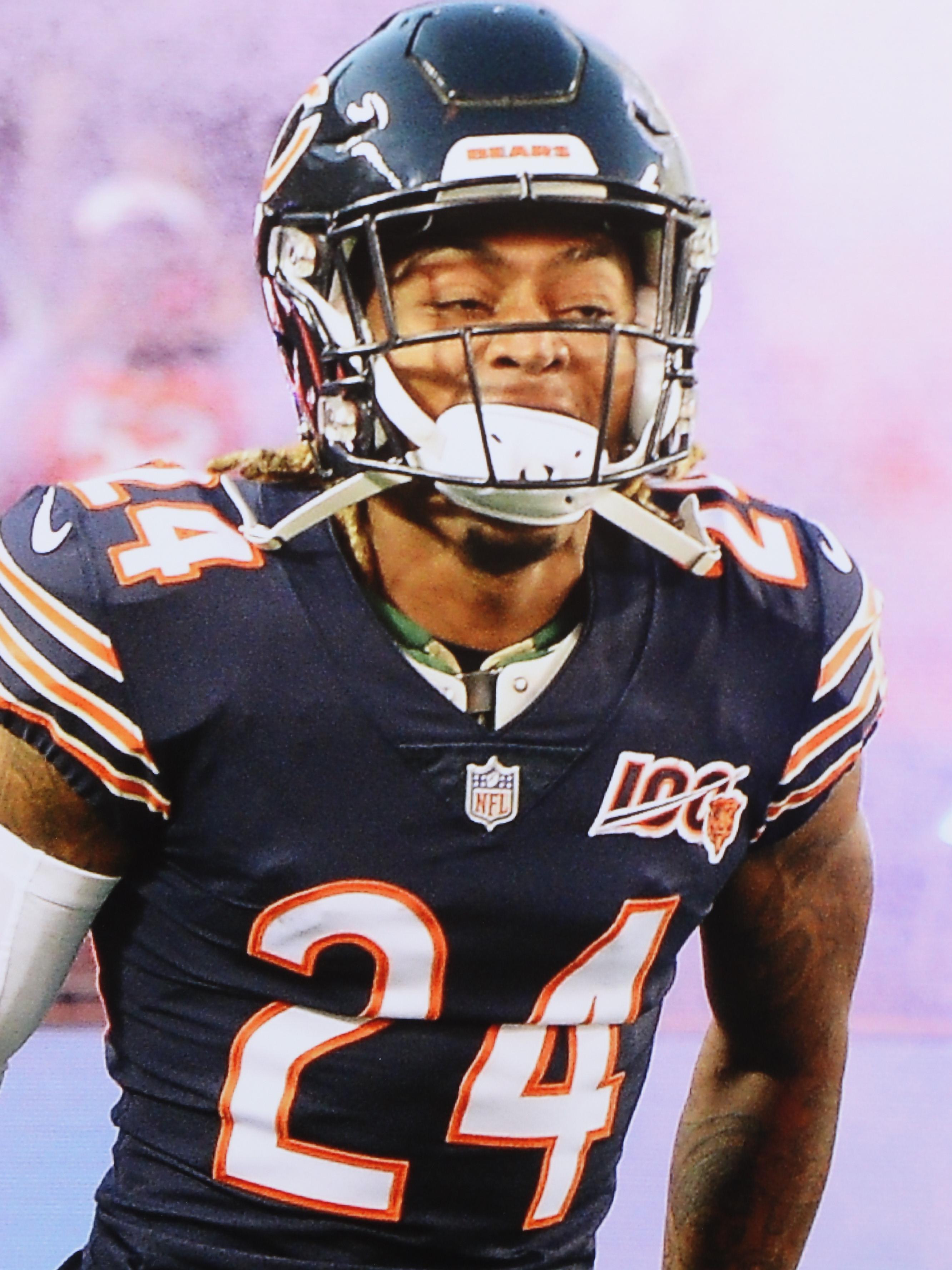 Nine NFL Photo Prints and Posters