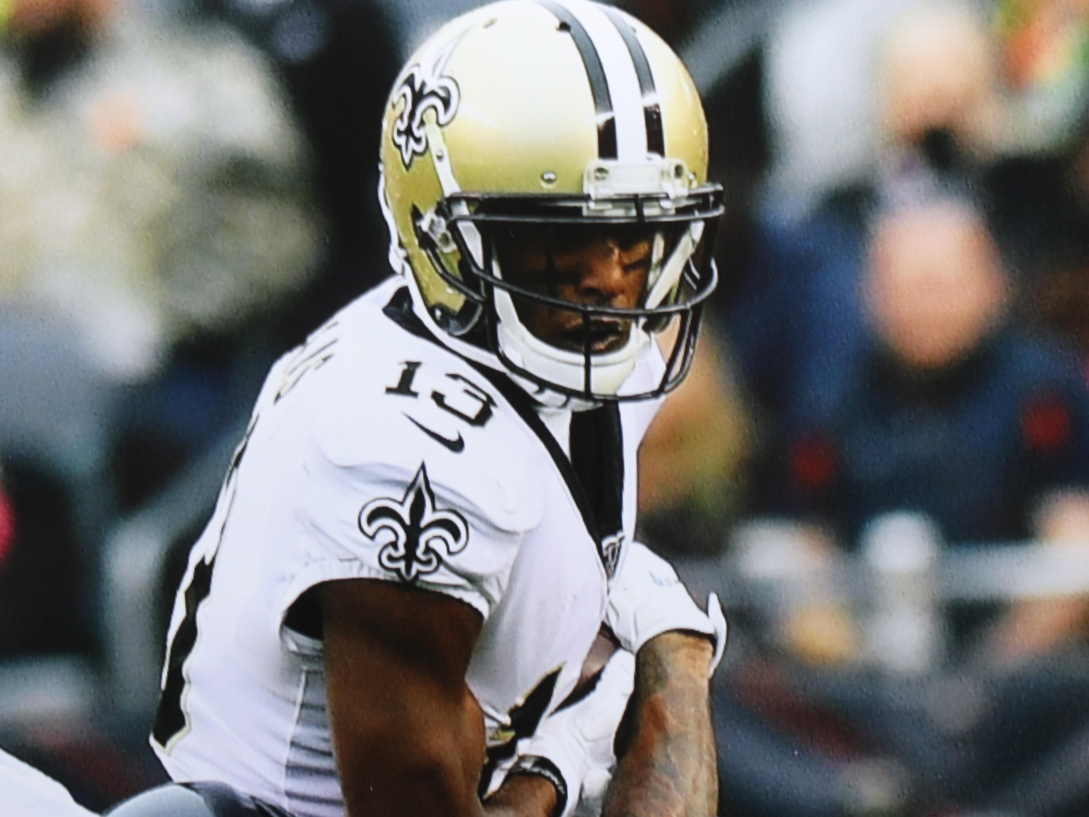 Nine NFL Photo Prints and Posters