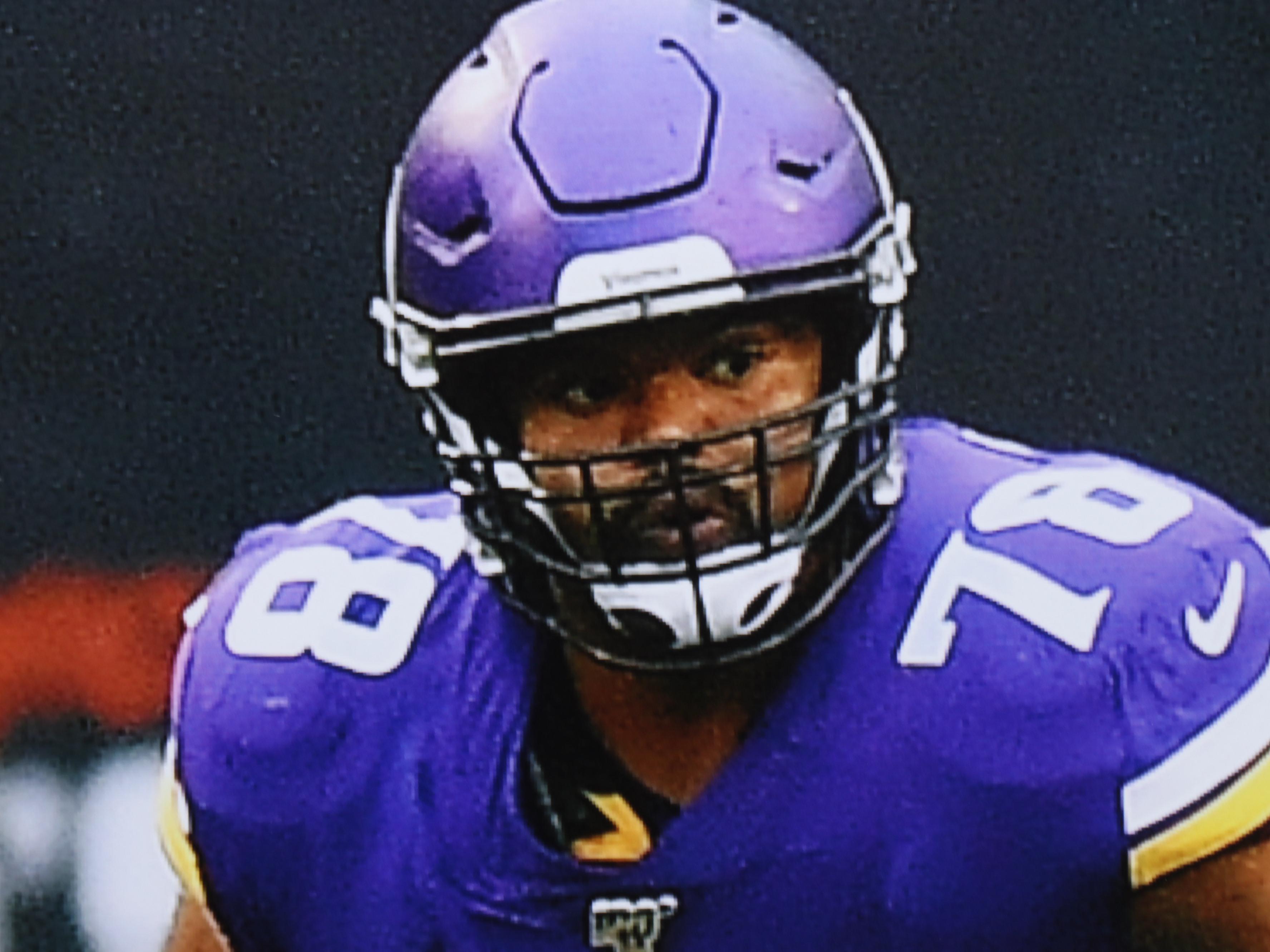 Nine NFL Photo Prints and Posters