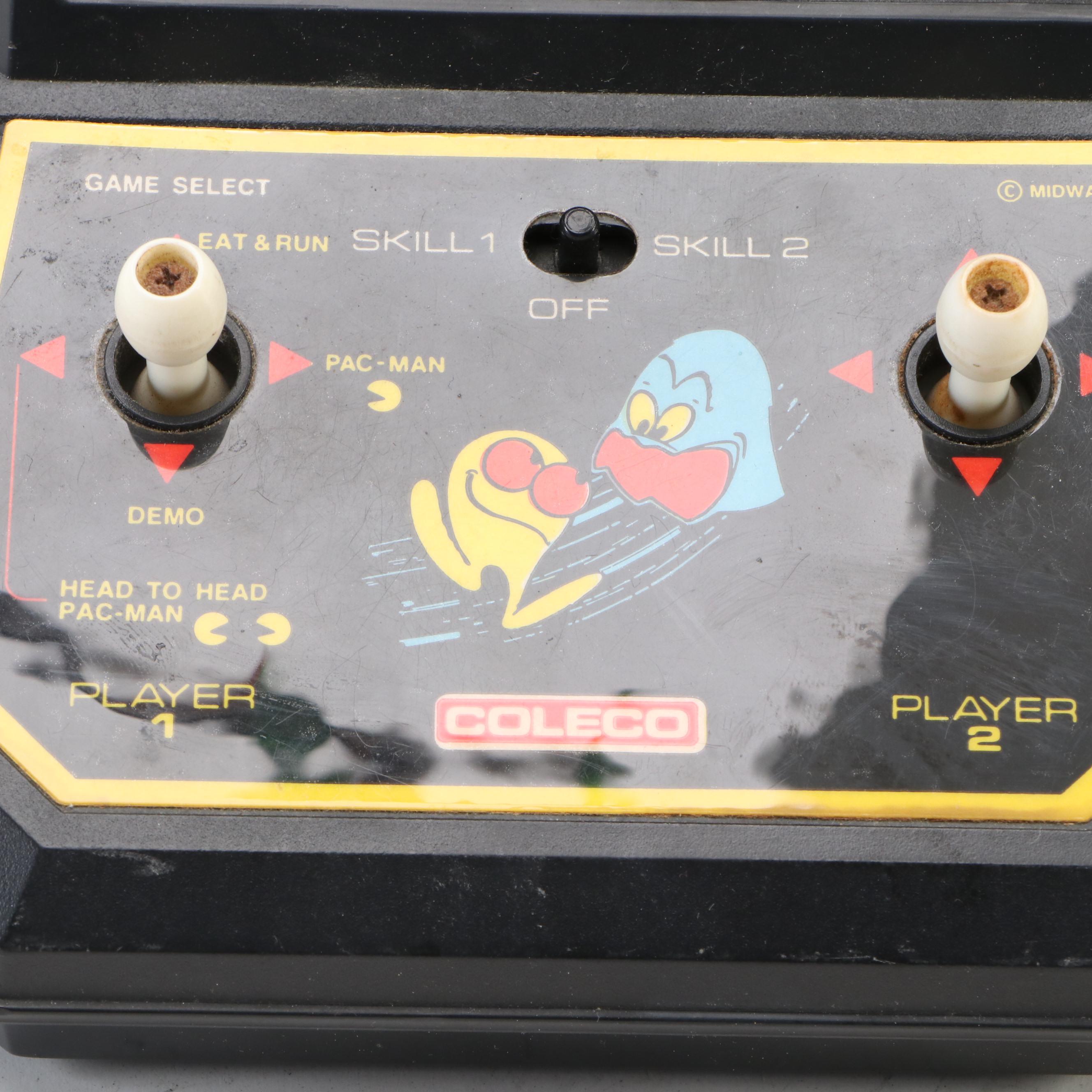 Coleco Pac-Man and Tomytronic Scramble with Other Mini-Arcade Games, 1980-1981