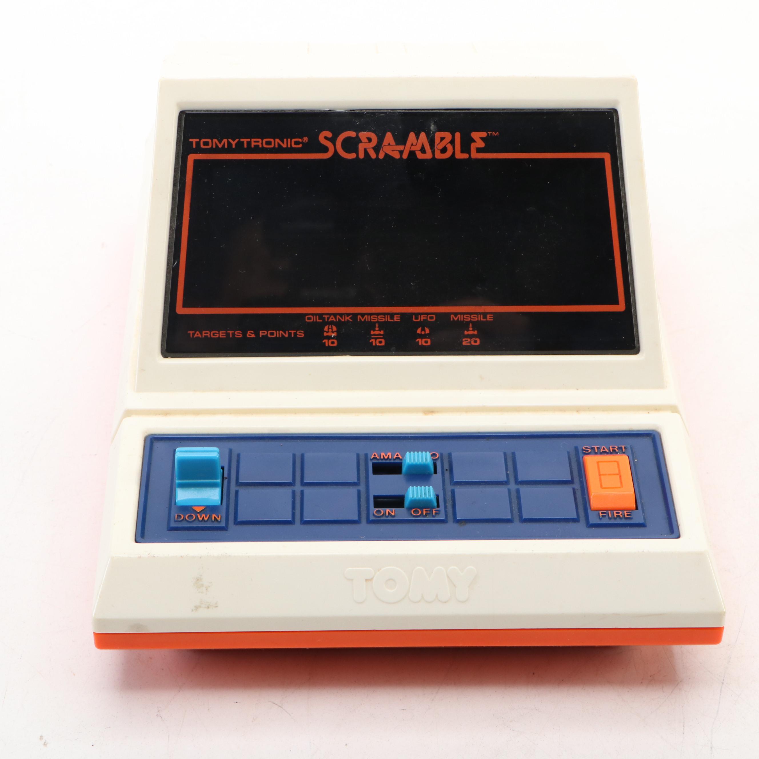 Coleco Pac-Man and Tomytronic Scramble with Other Mini-Arcade Games, 1980-1981