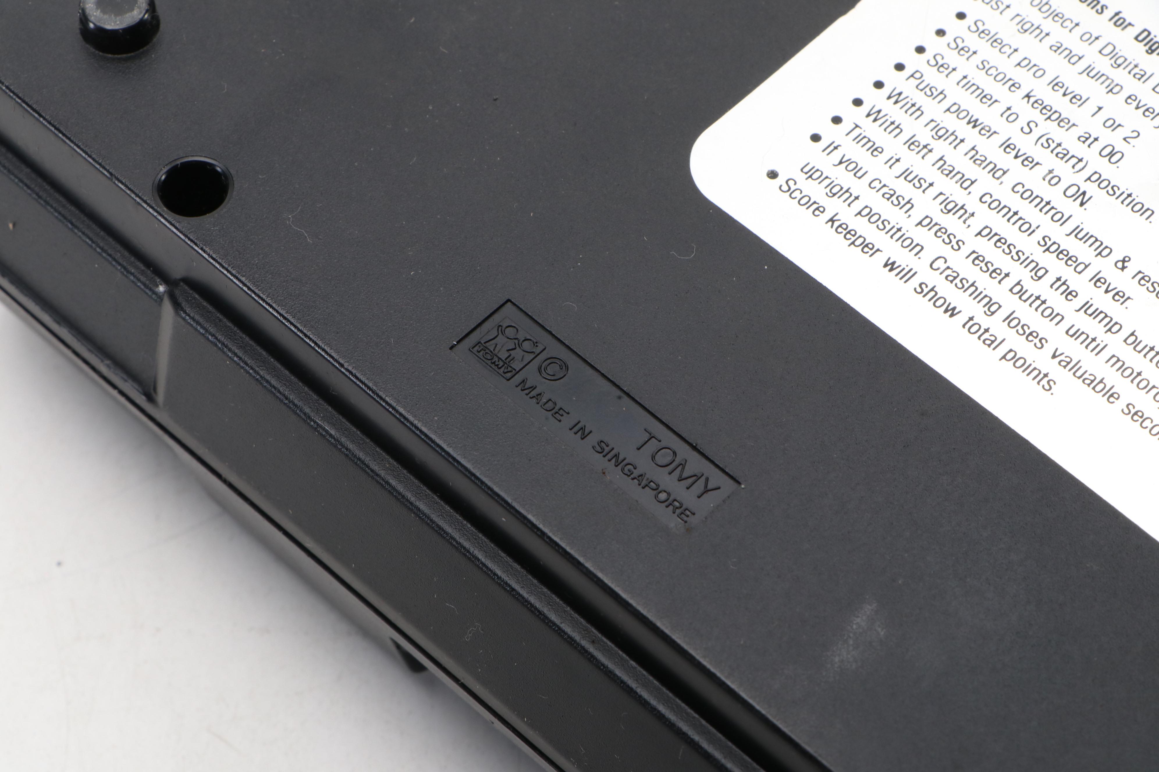 Coleco Pac-Man and Tomytronic Scramble with Other Mini-Arcade Games, 1980-1981