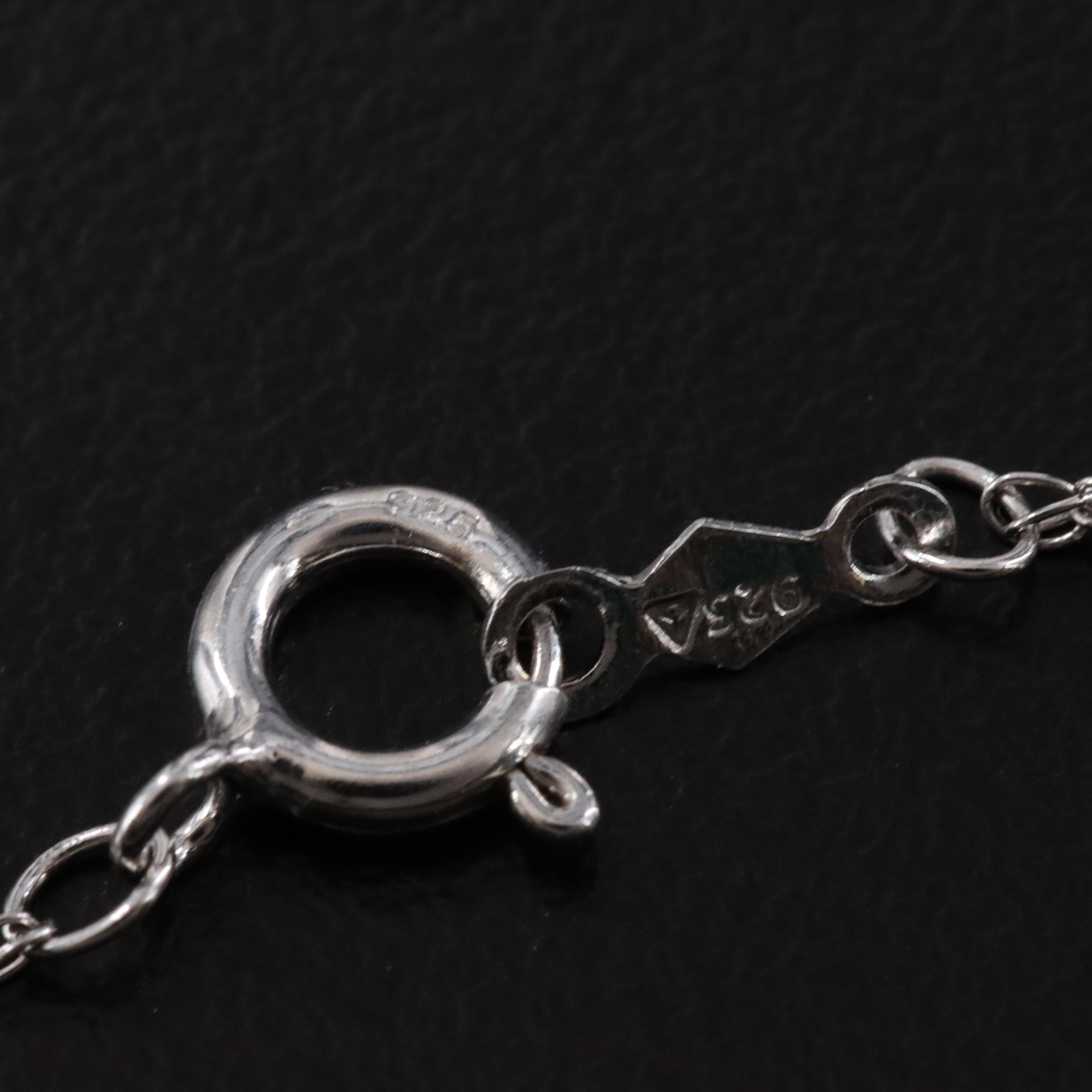 Sterling Blue Topaz and Diamond Trembler Pendant Necklace