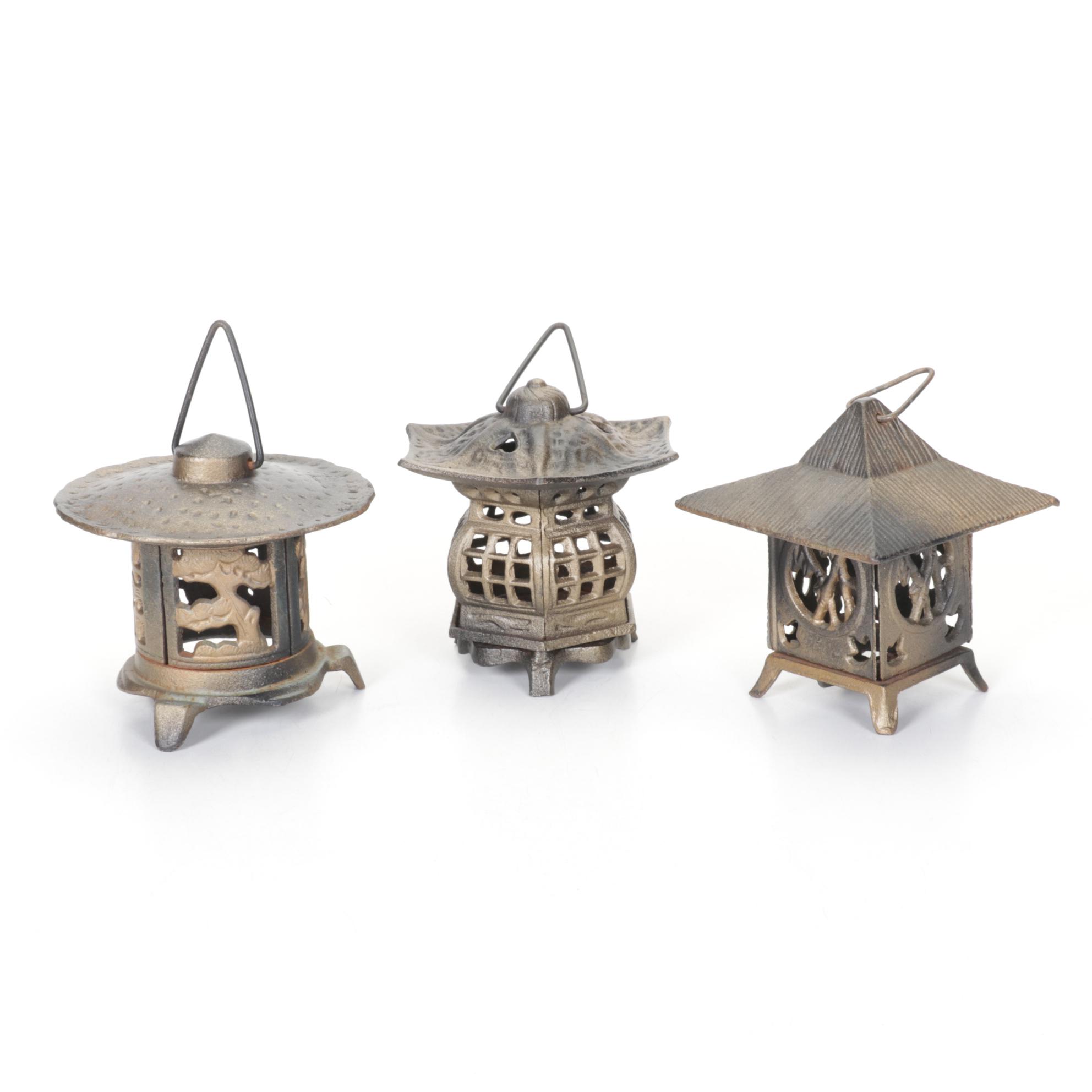 Three Cast Iron Pagoda Style Hanging Lanterns