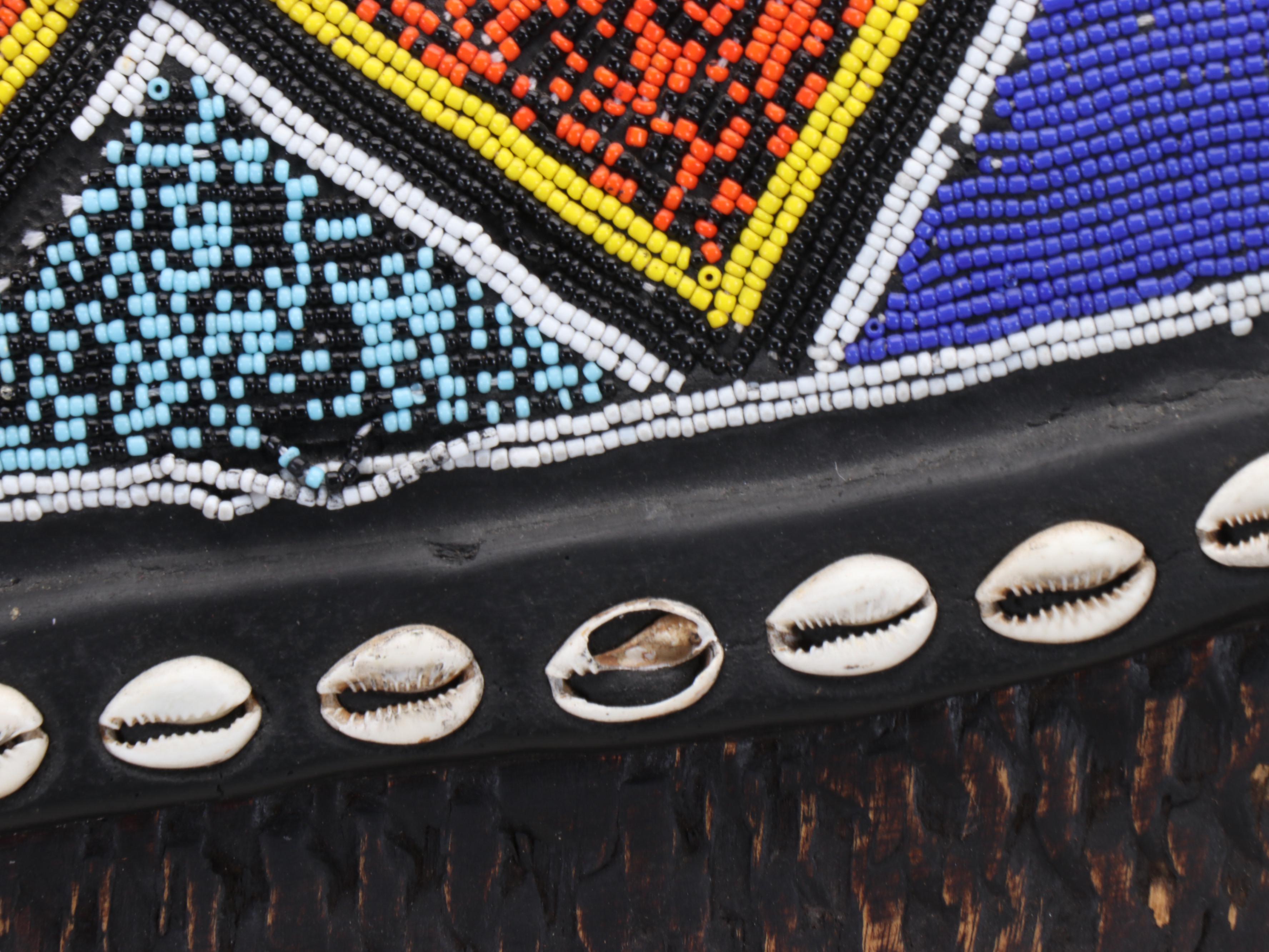 Hanging Carved Wood and Beadwork Sankofa Wall Sculpture