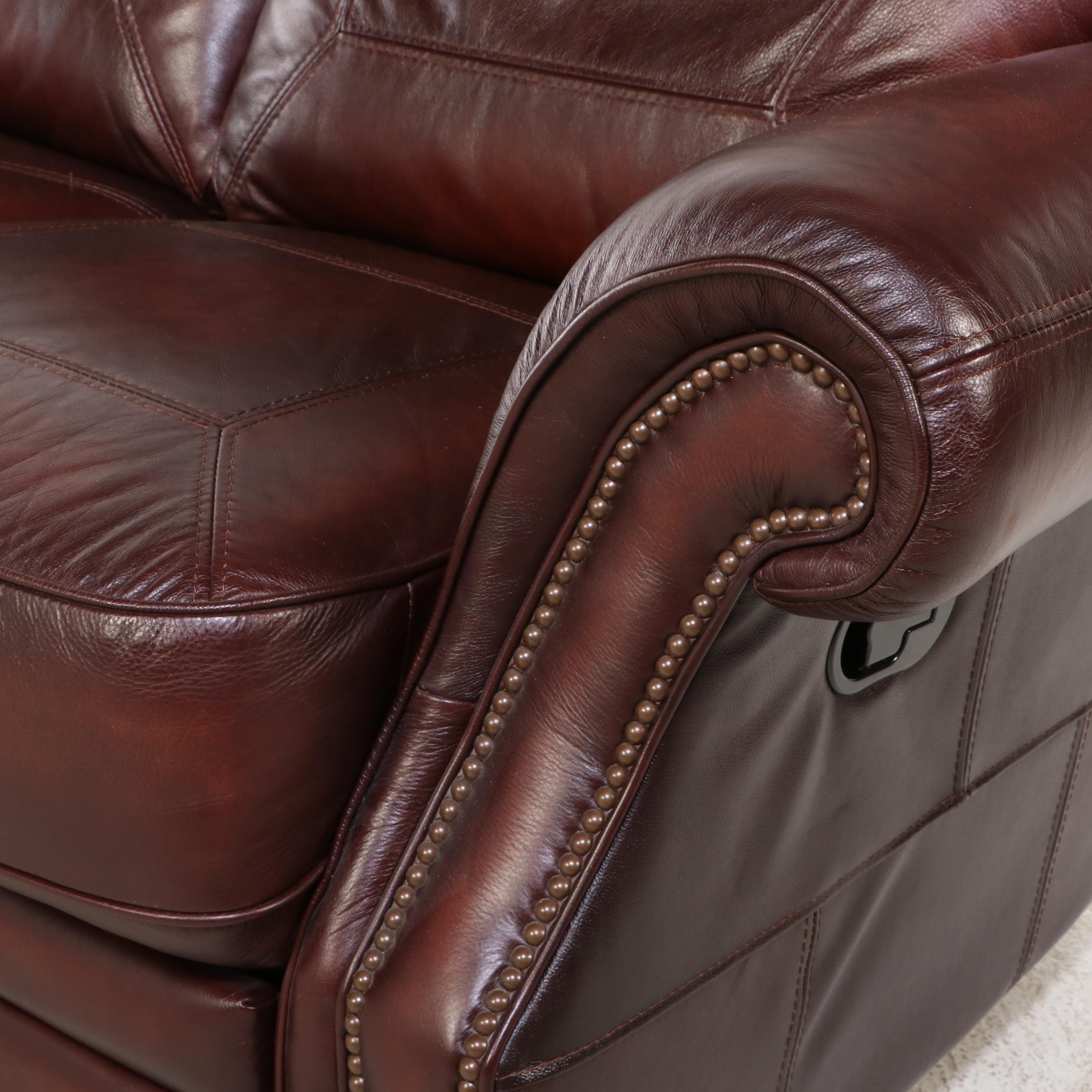 Leather Upholstered Reclining Sofa with Nailhead Trim