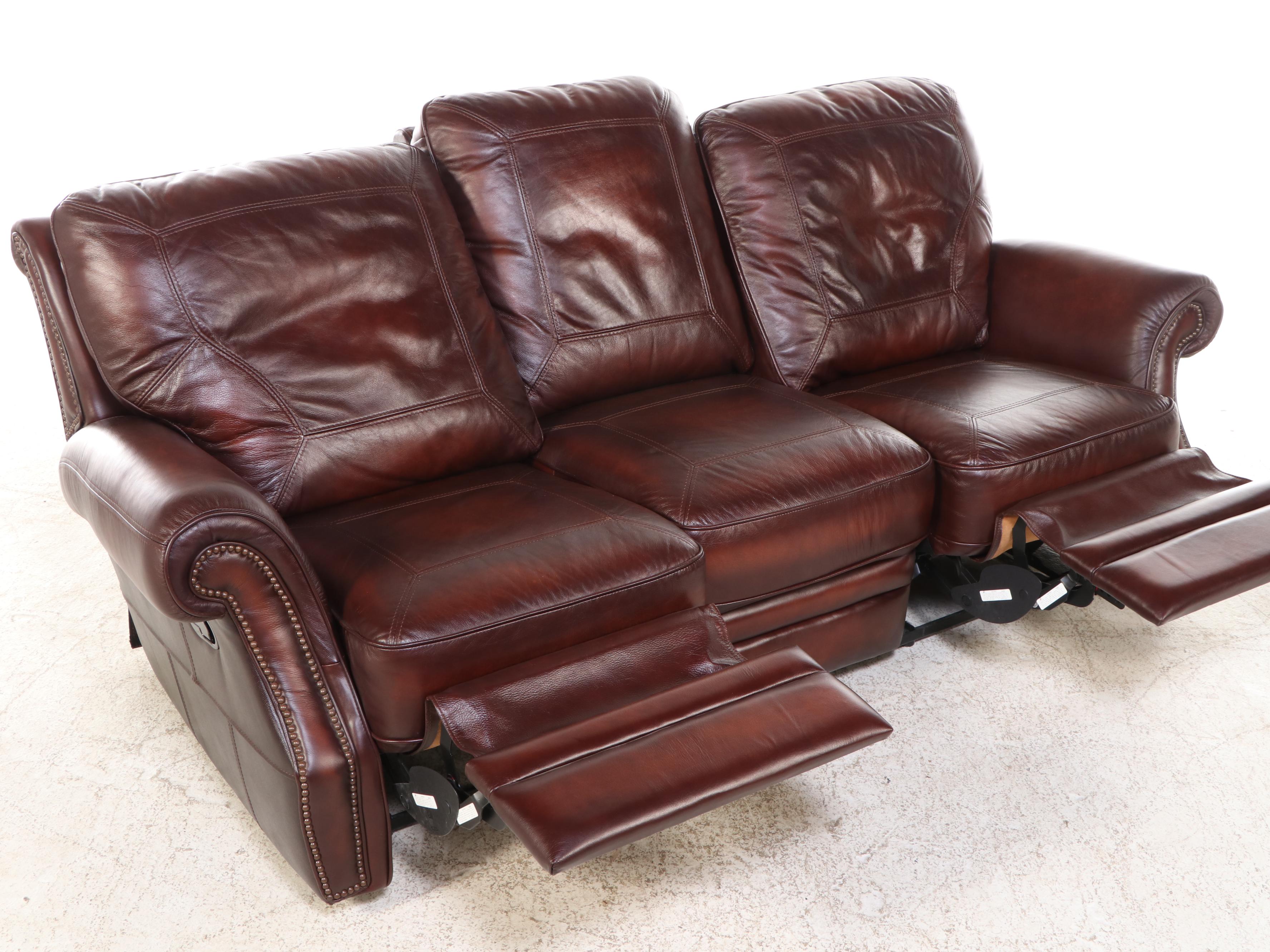 Leather Upholstered Reclining Sofa with Nailhead Trim