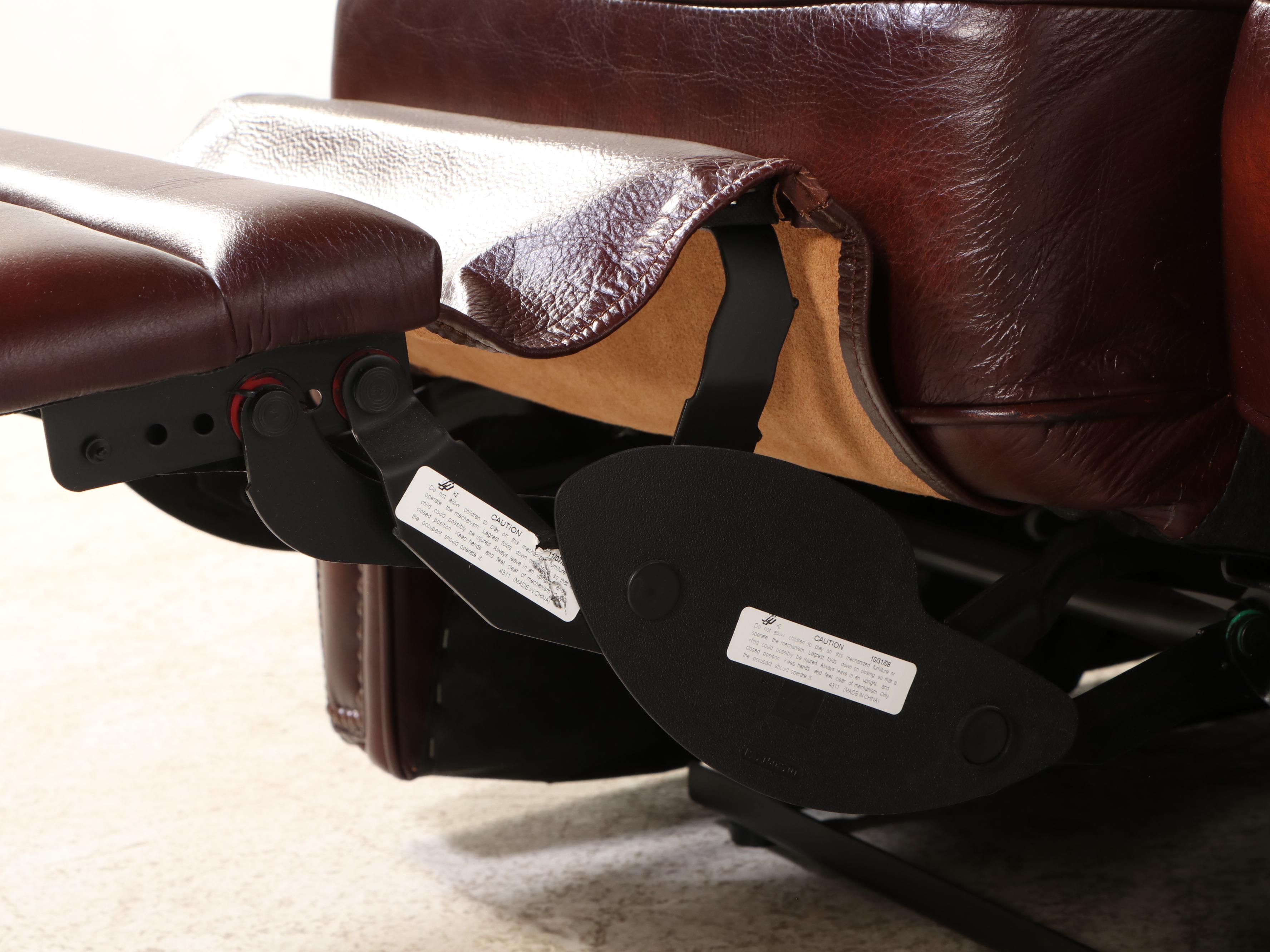 Leather Upholstered Reclining Sofa with Nailhead Trim