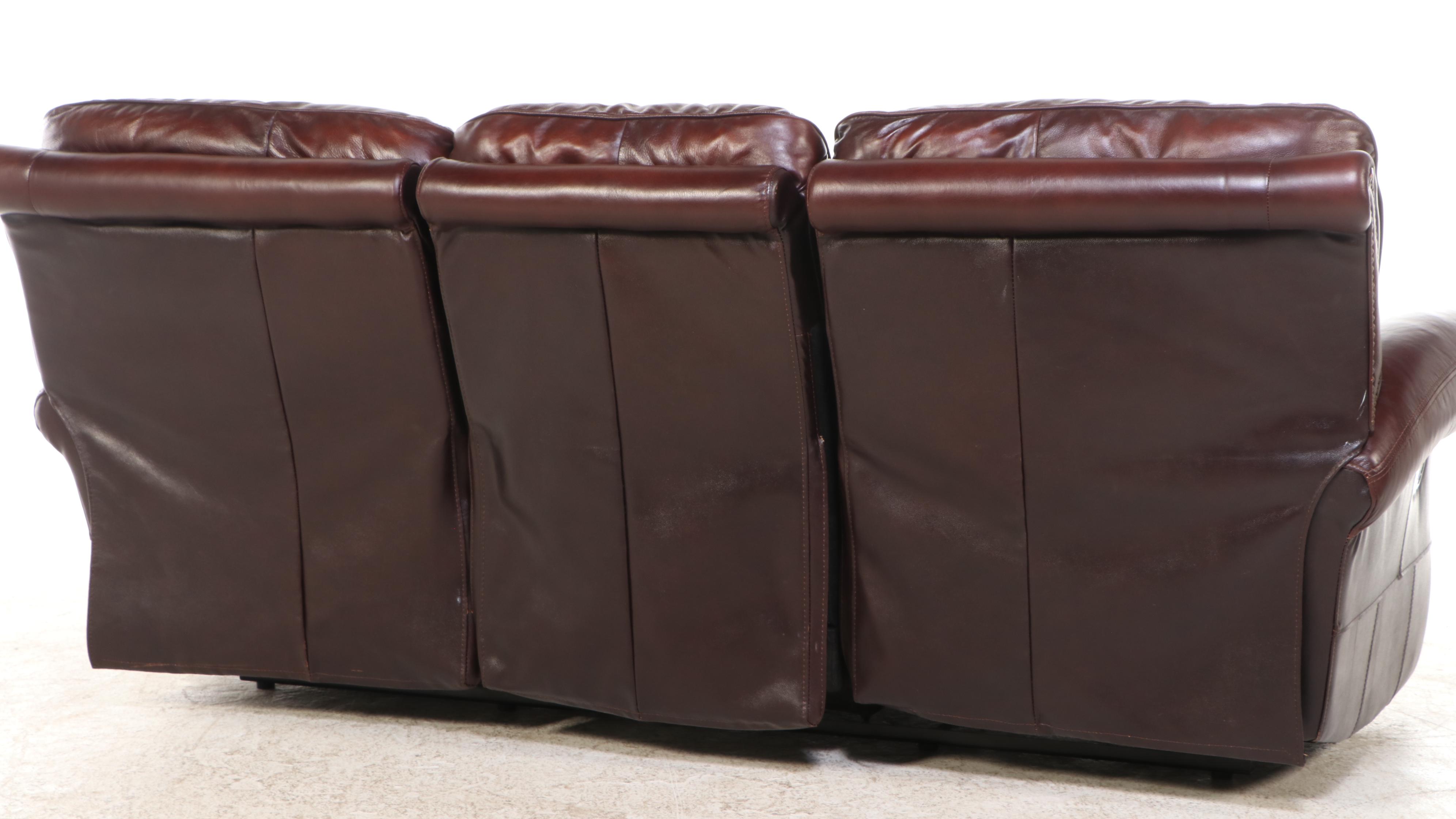 Leather Upholstered Reclining Sofa with Nailhead Trim