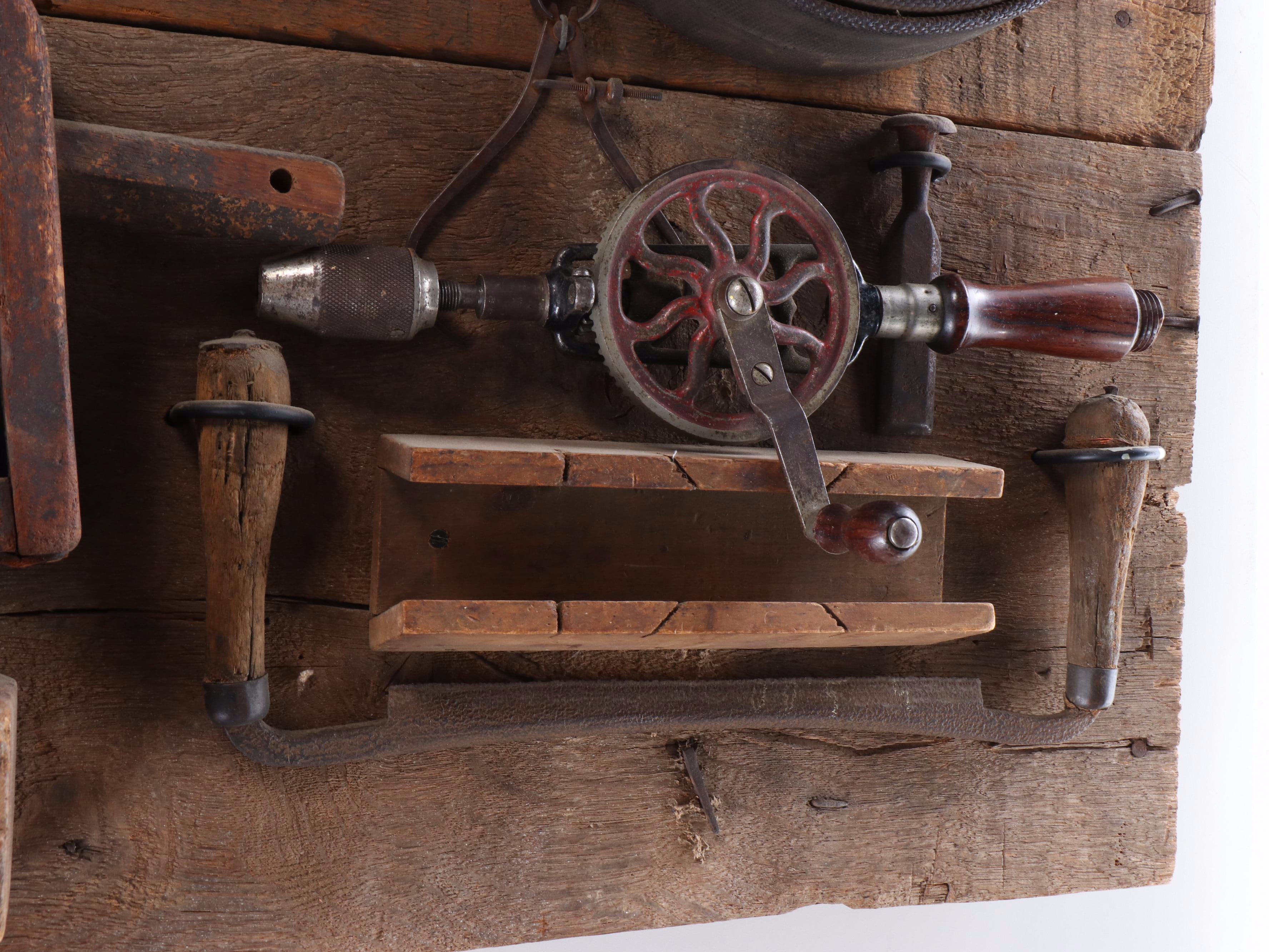 Hanging Wooden Board with Mounted Tools