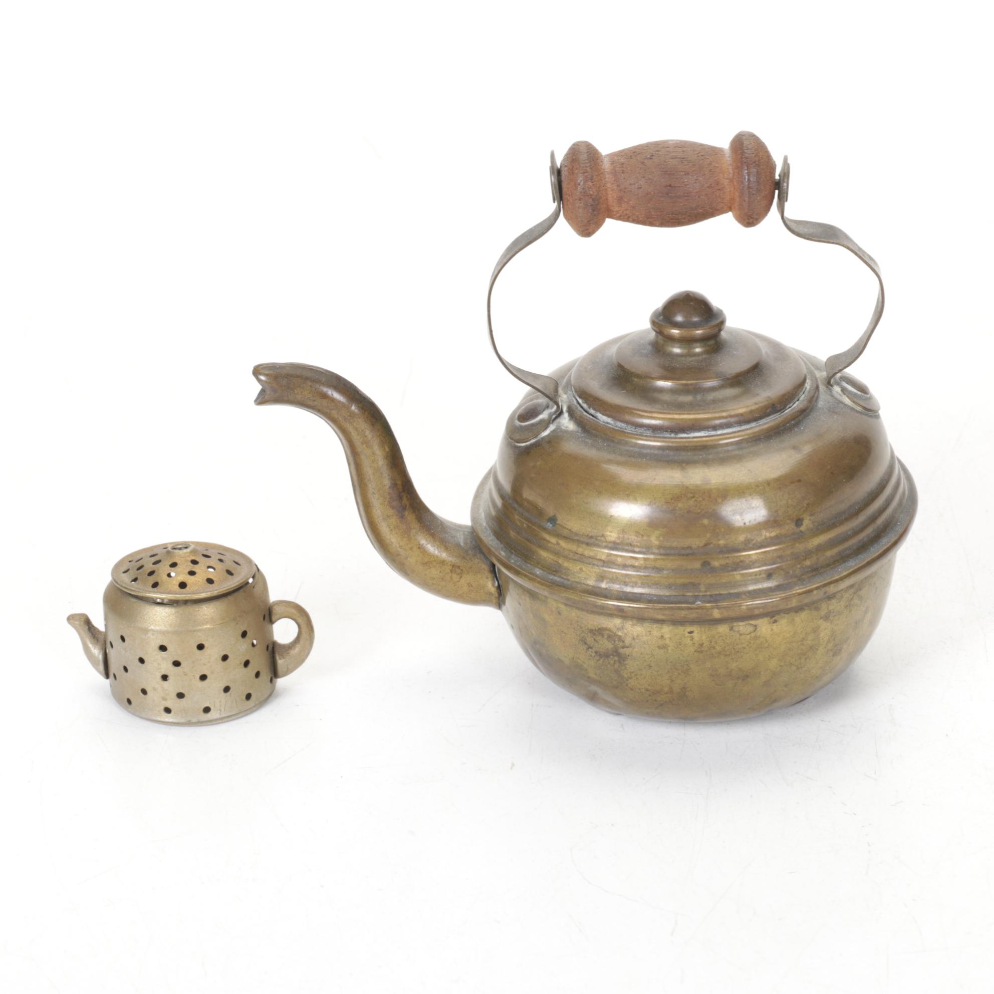 Brass Teapots include Etched Floral Motif, Wood Handles and Tea Strainer