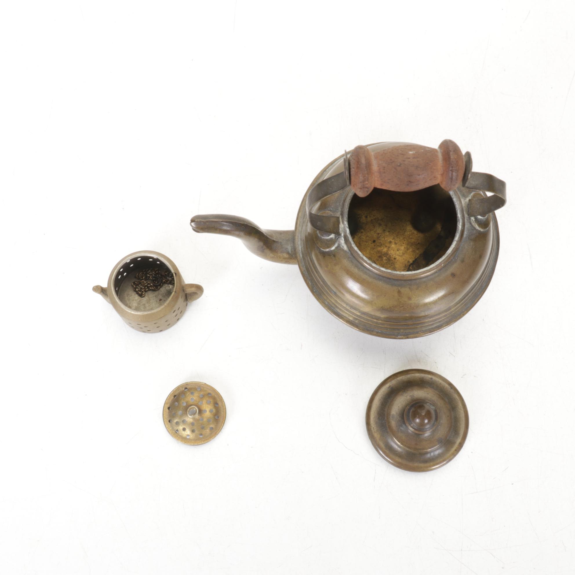 Brass Teapots include Etched Floral Motif, Wood Handles and Tea Strainer