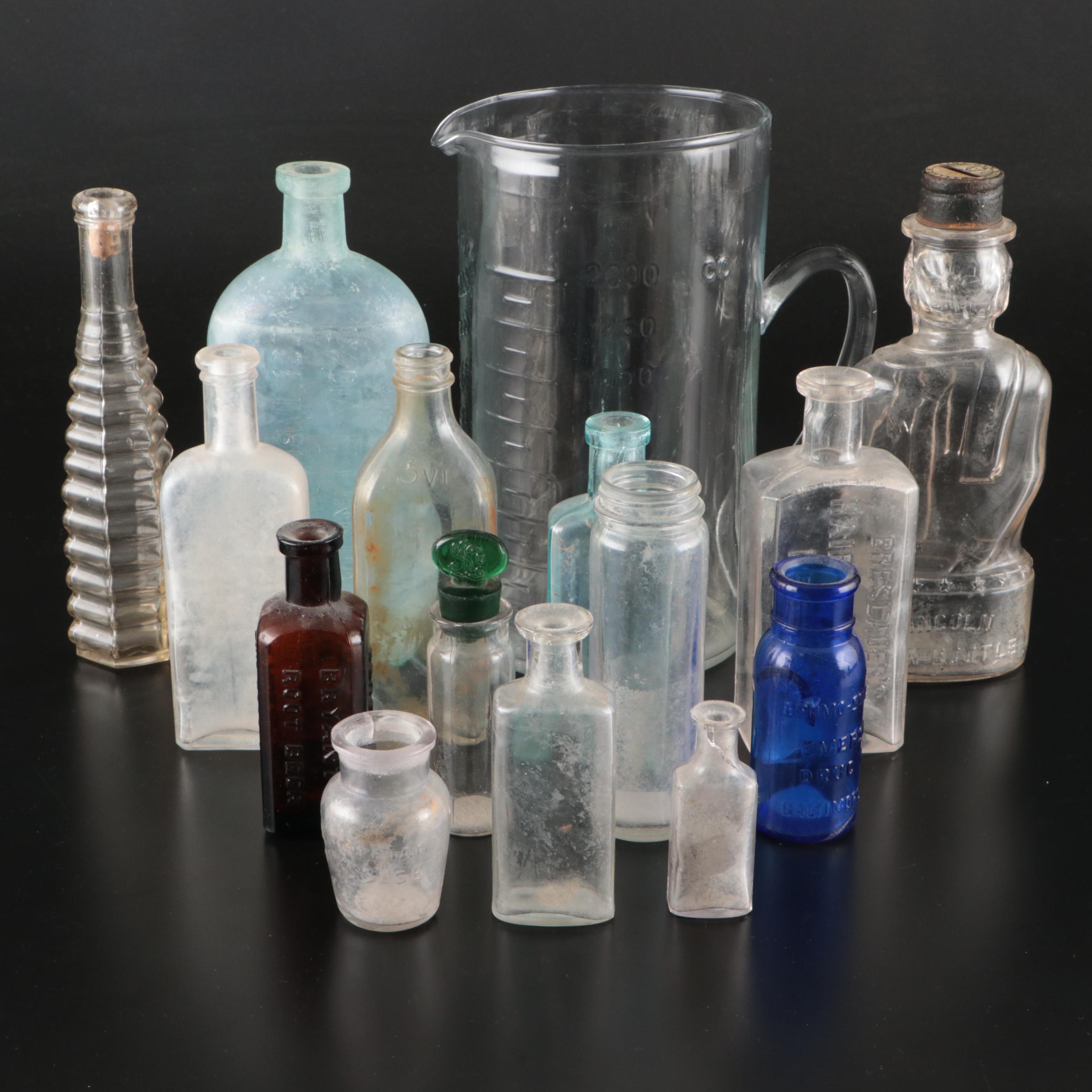 Lincoln Bank Bottle, Beaker Style Pitcher, and Other Glass Bottles and Jars