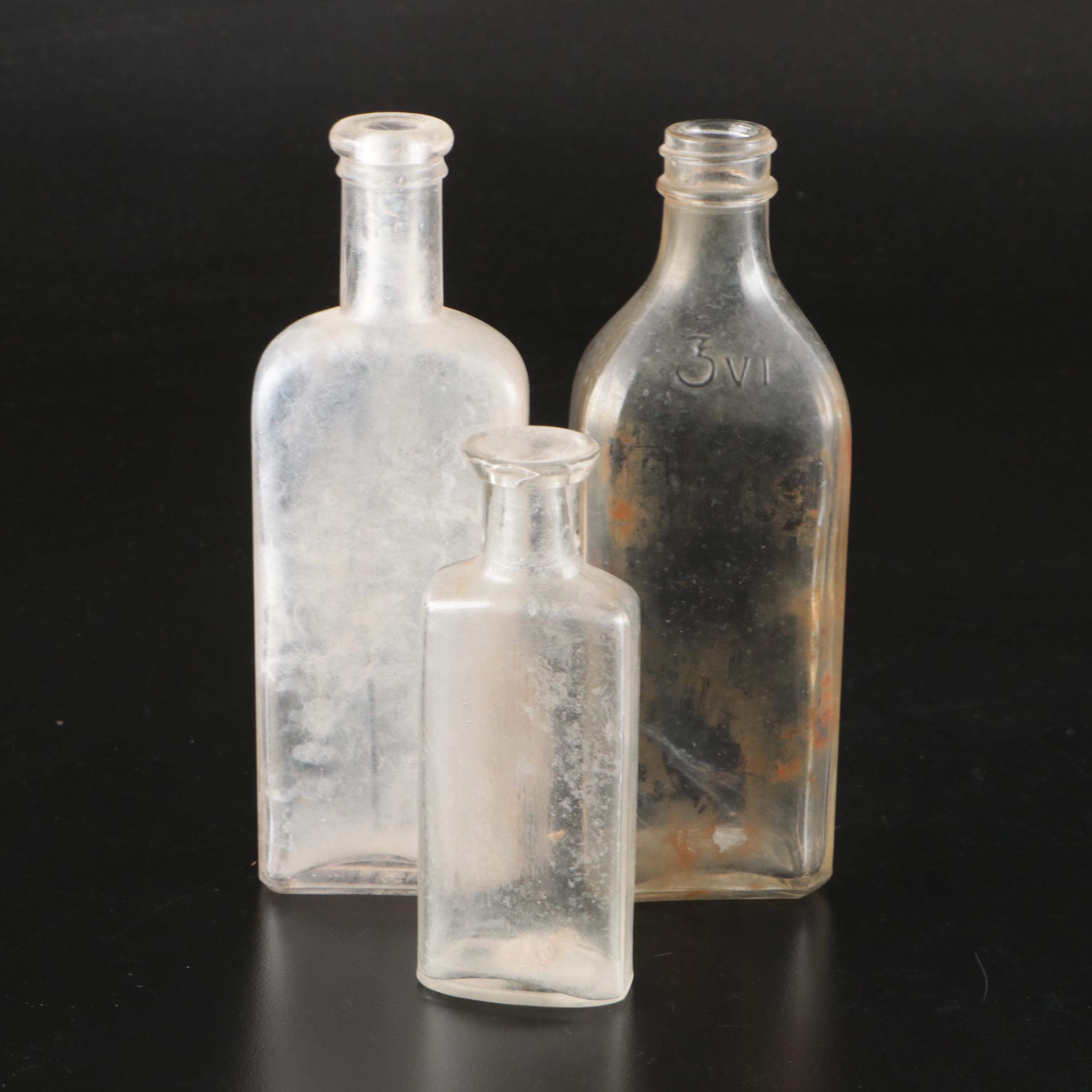Lincoln Bank Bottle, Beaker Style Pitcher, and Other Glass Bottles and Jars