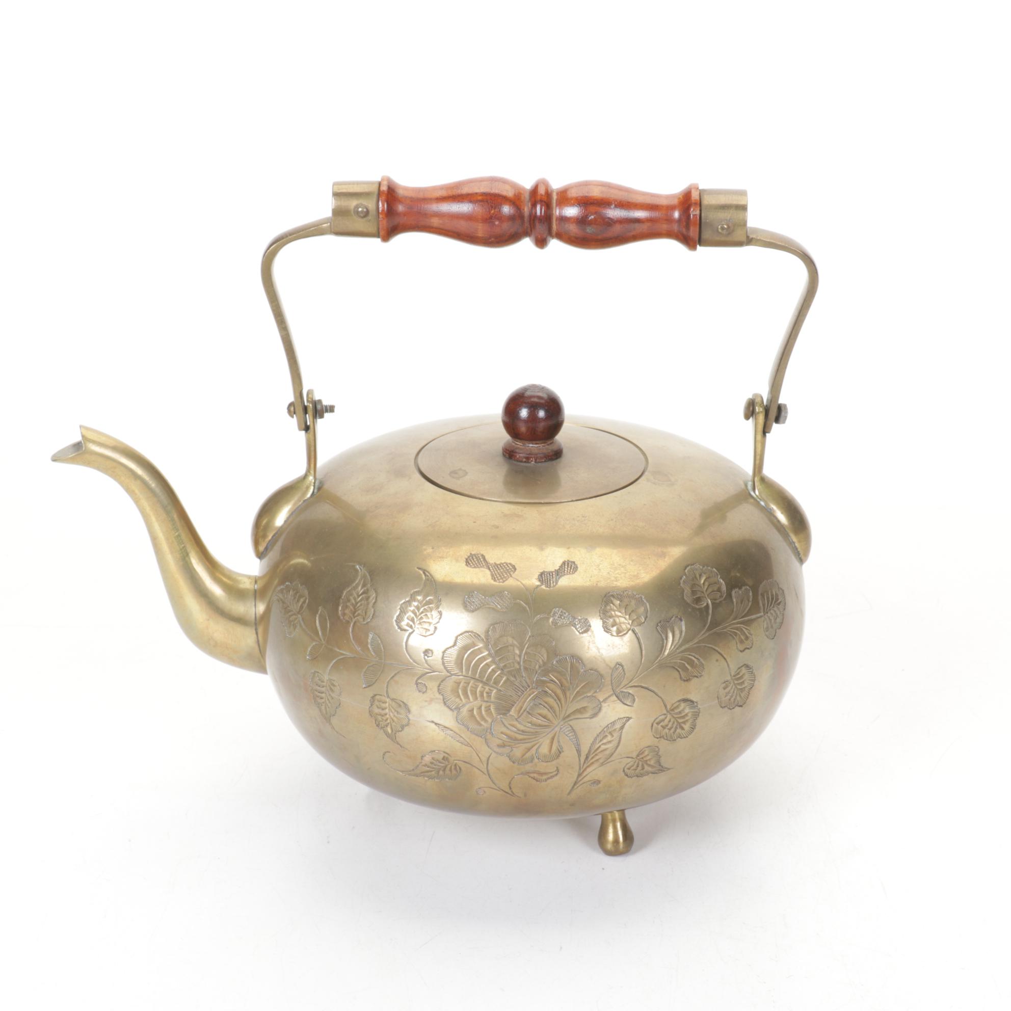 Brass and Metal Tea Kettles With Etched and Patterned Designs and Wooden Accents