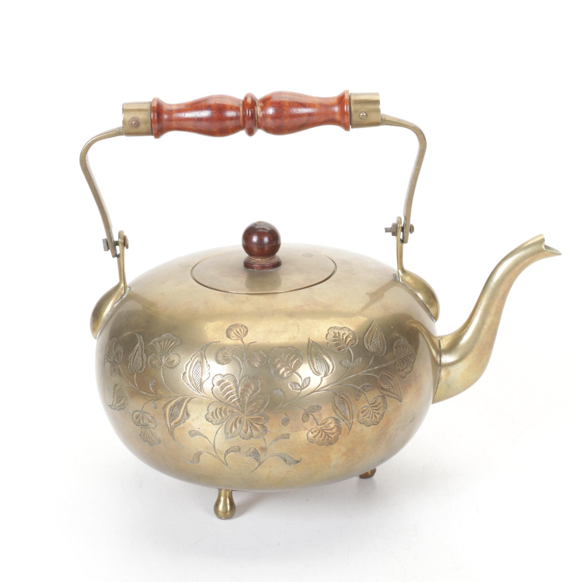 Brass and Metal Tea Kettles With Etched and Patterned Designs and Wooden Accents