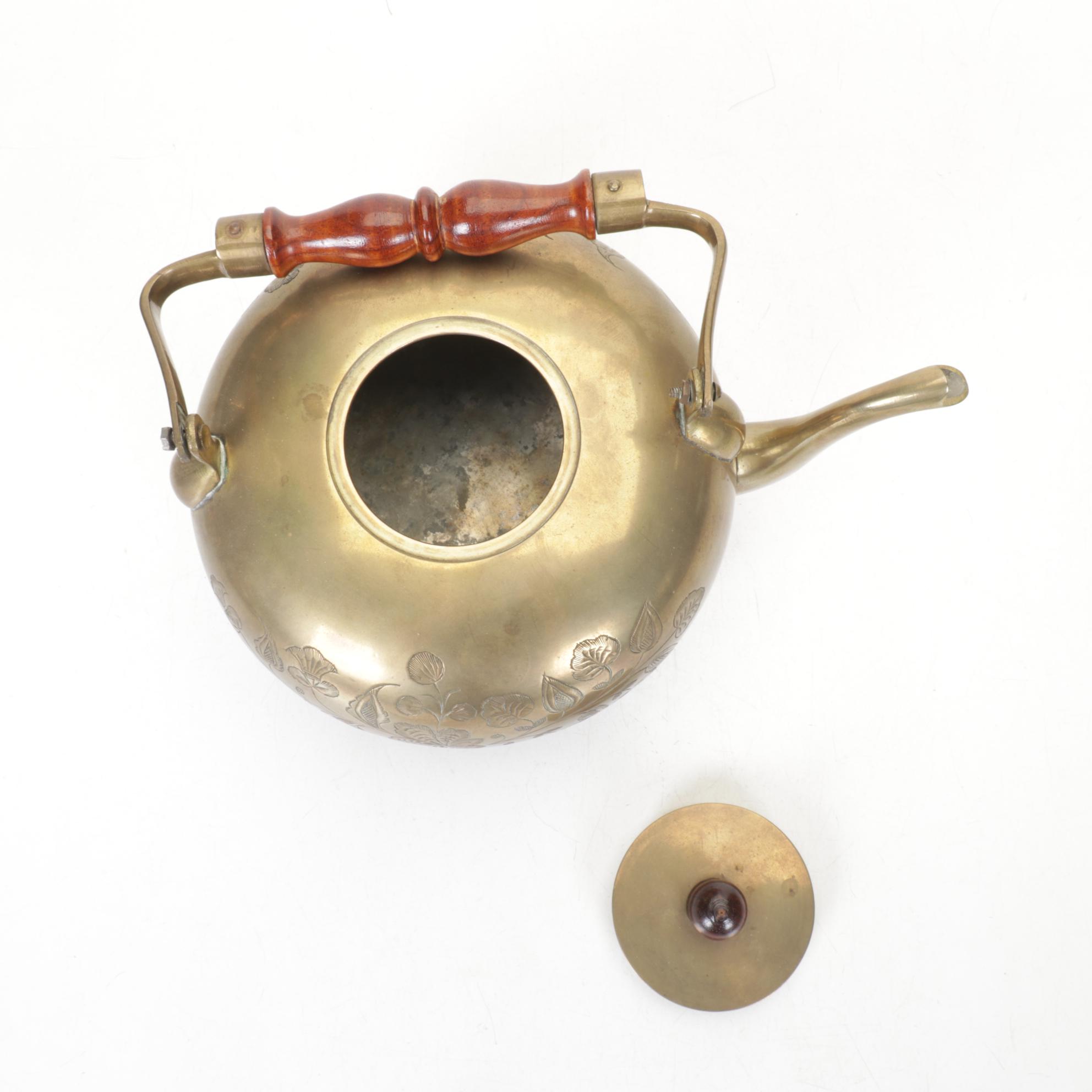 Brass and Metal Tea Kettles With Etched and Patterned Designs and Wooden Accents