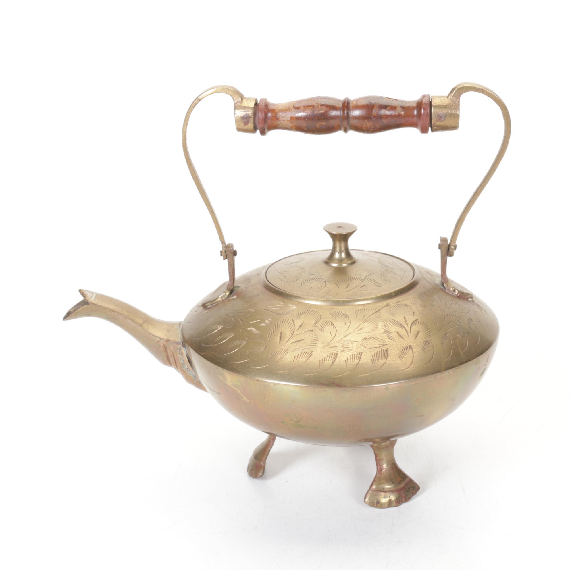 Brass and Metal Tea Kettles With Etched and Patterned Designs and Wooden Accents
