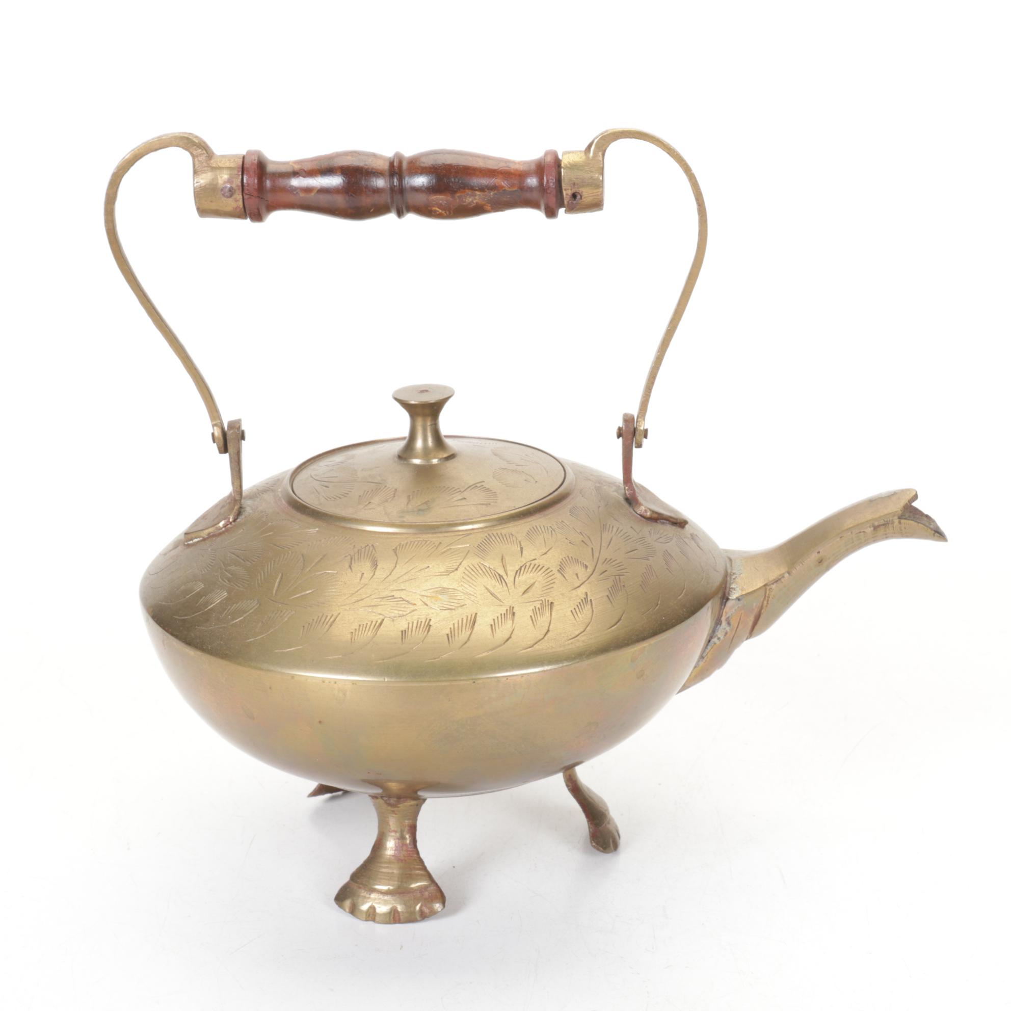 Brass and Metal Tea Kettles With Etched and Patterned Designs and Wooden Accents