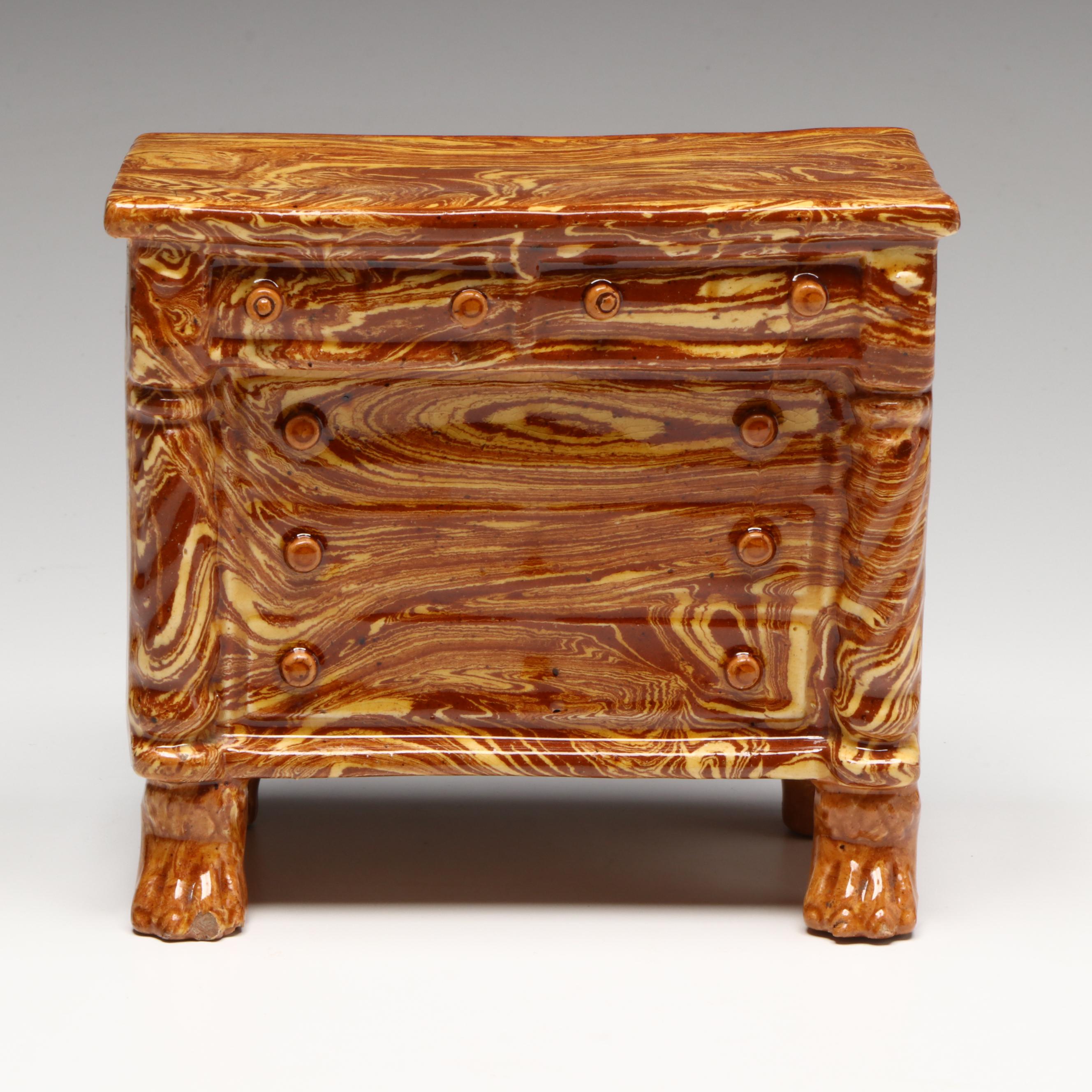 Pennsylvania Swirled Redware Chest of Drawers Bank, 19th Century