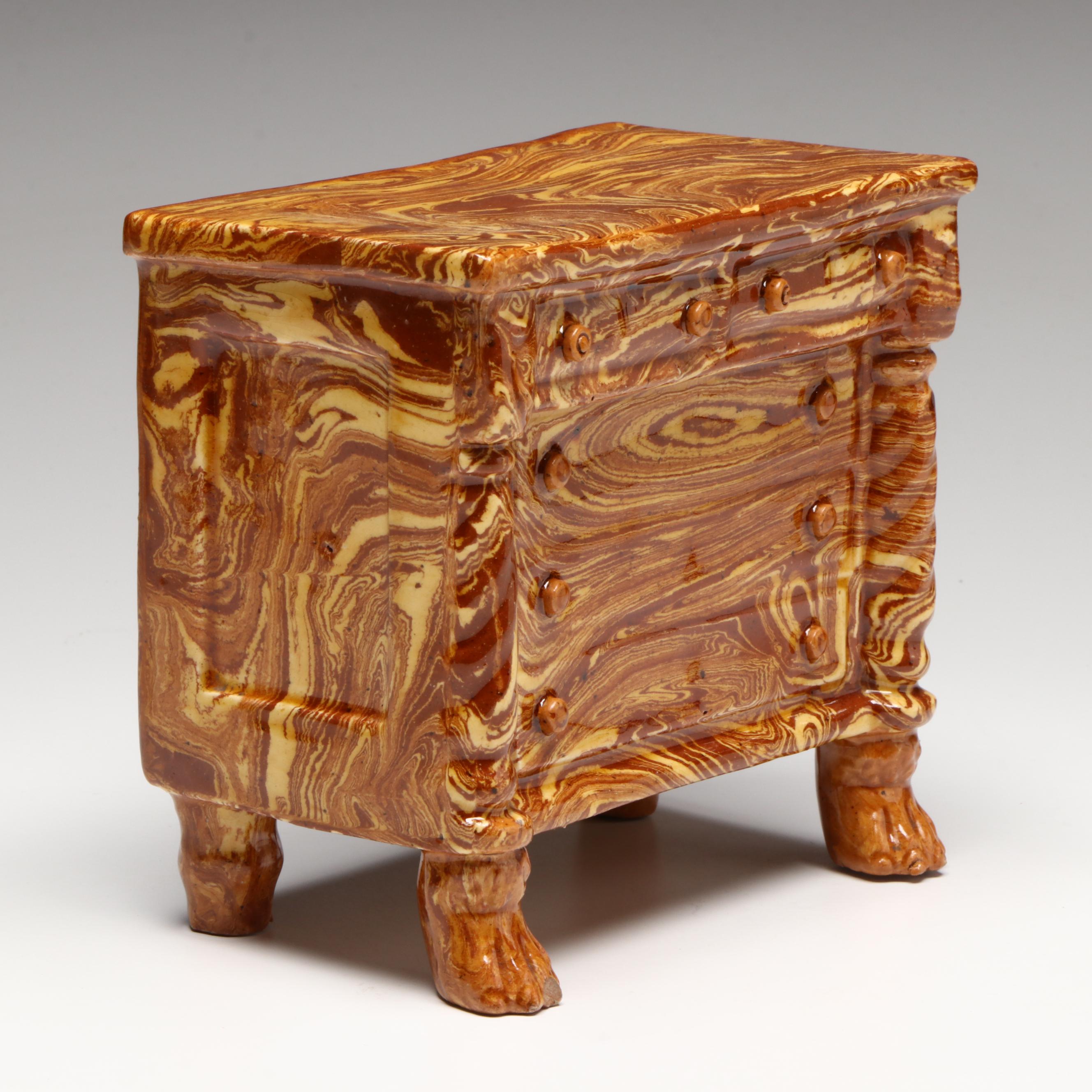 Pennsylvania Swirled Redware Chest of Drawers Bank, 19th Century