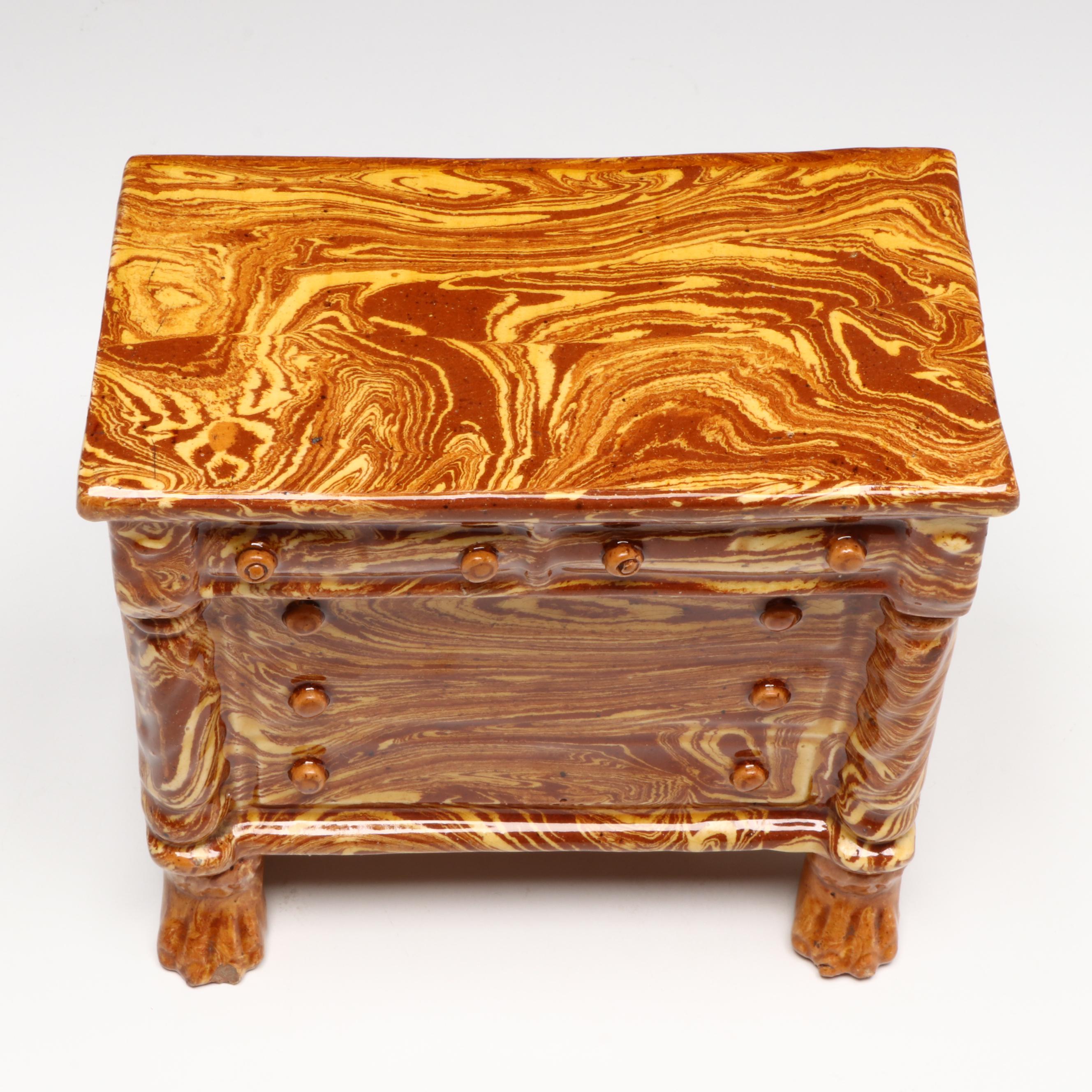 Pennsylvania Swirled Redware Chest of Drawers Bank, 19th Century