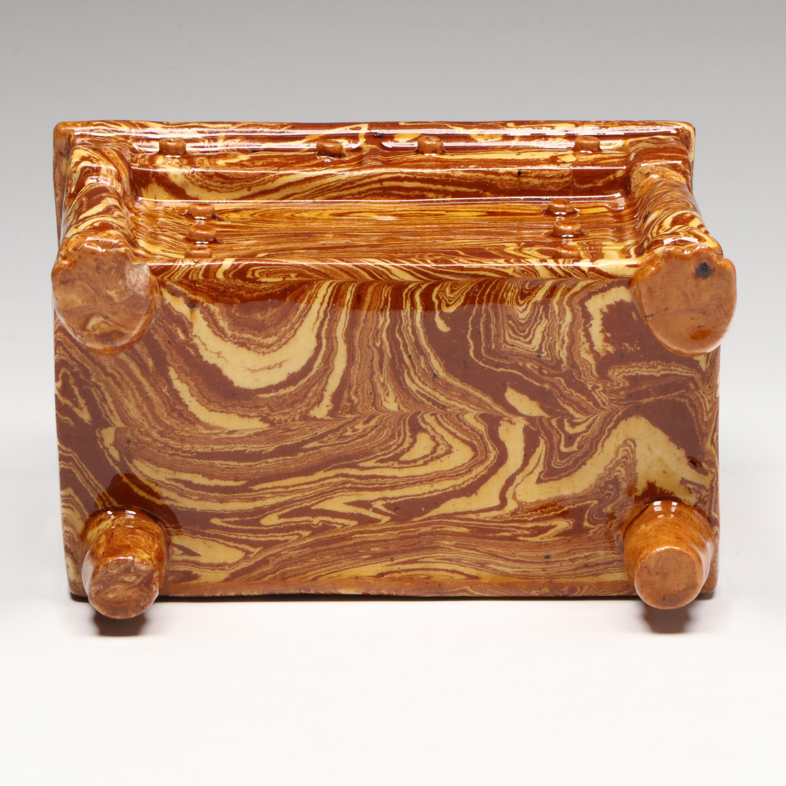 Pennsylvania Swirled Redware Chest of Drawers Bank, 19th Century