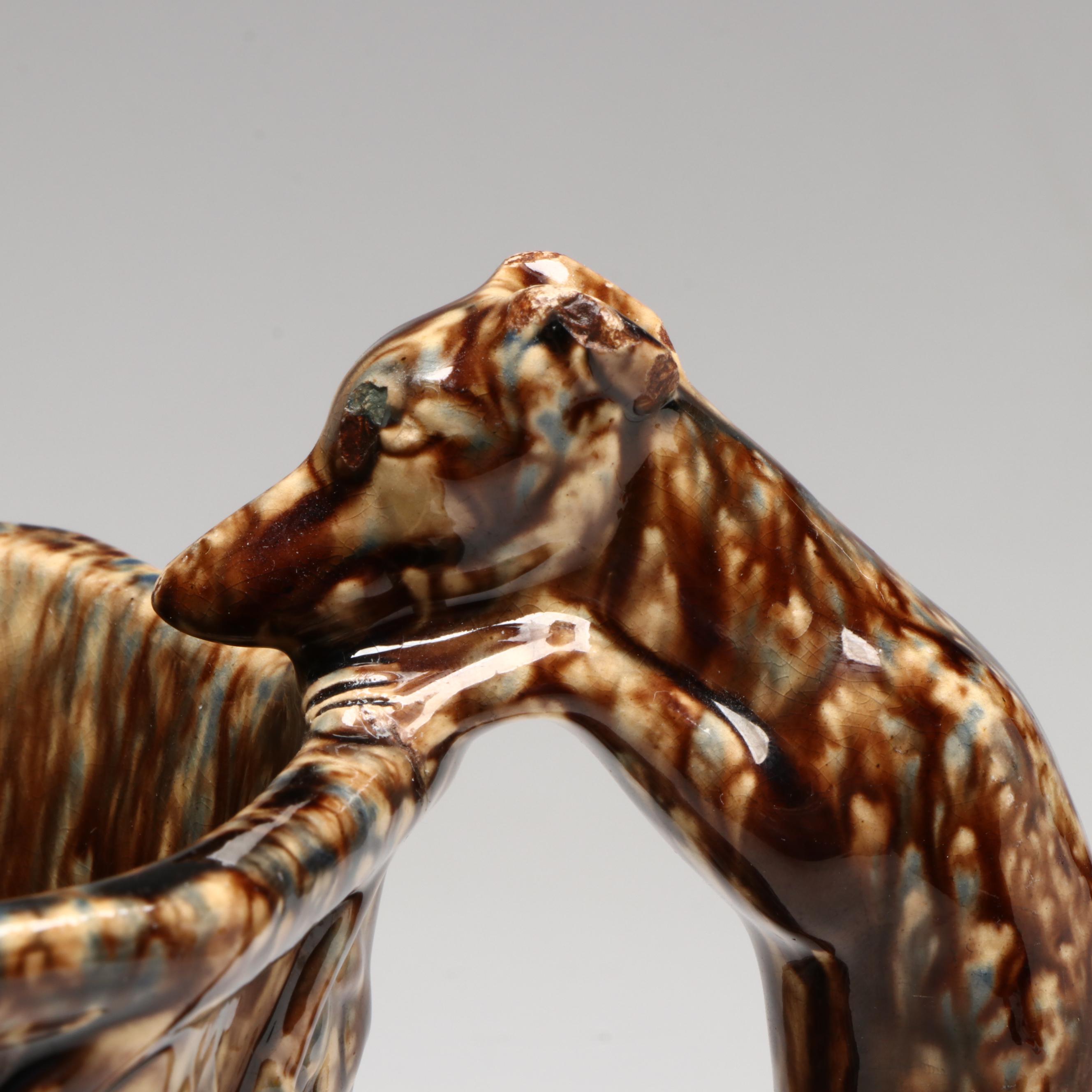 Rockingham Glazed Hound-Handled Earthenware Pitcher, Mid-19th Century