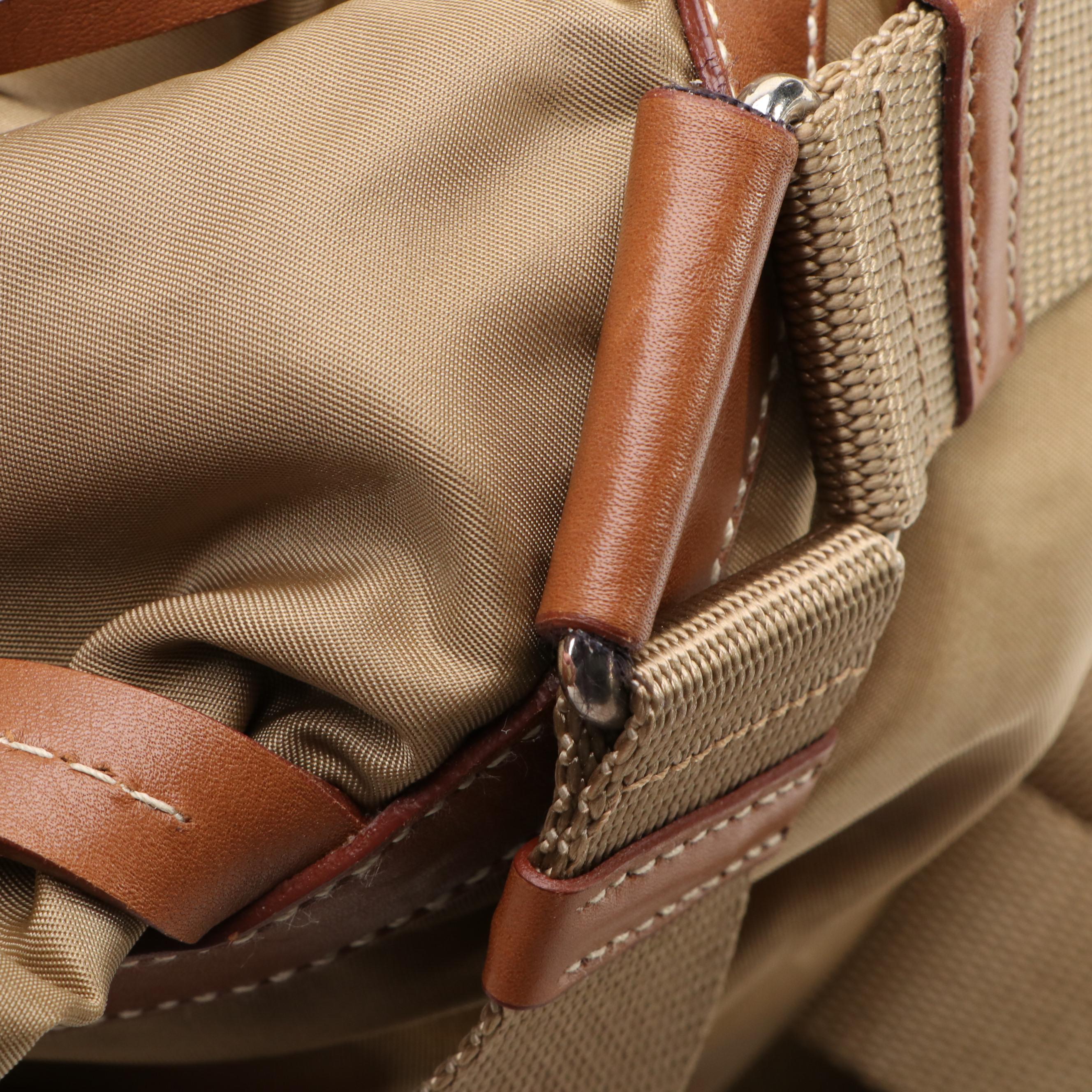 Prada Double Pocket Drawstring Backpack in Nylon and Leather Trim