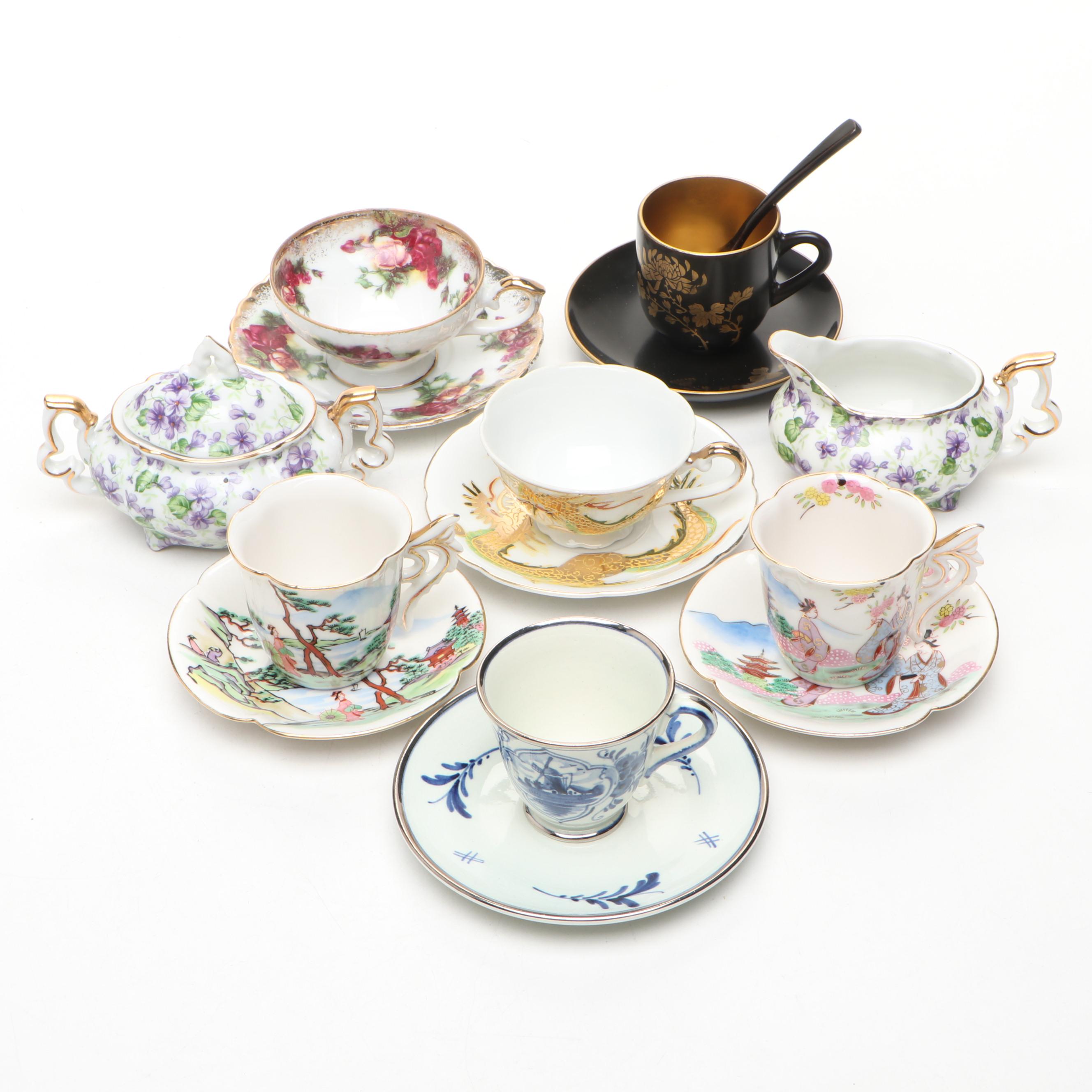 Hand Painted Delft Blue Porcelain Teacup and Saucer with More