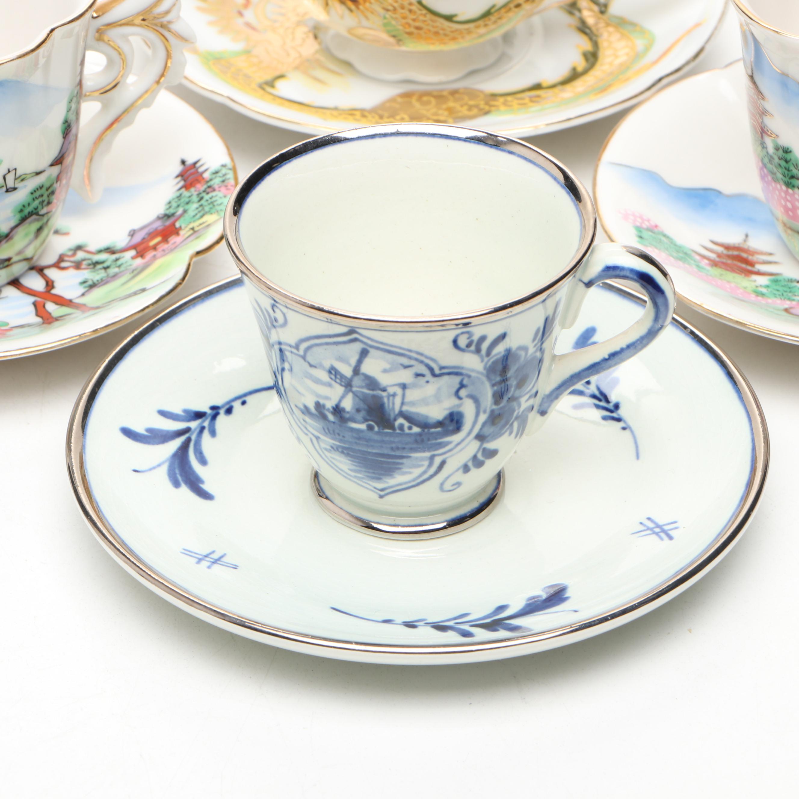 Hand Painted Delft Blue Porcelain Teacup and Saucer with More