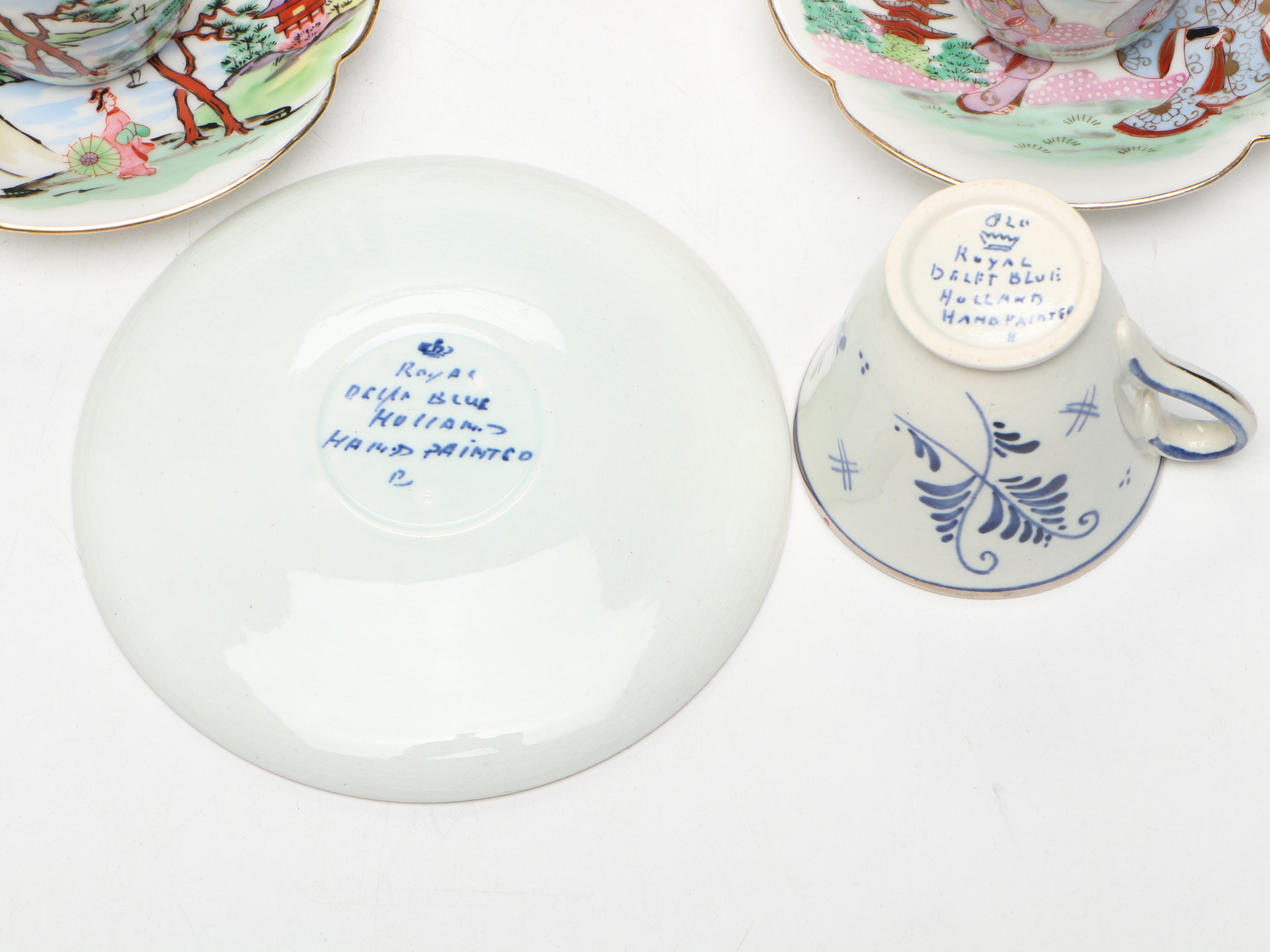 Hand Painted Delft Blue Porcelain Teacup and Saucer with More