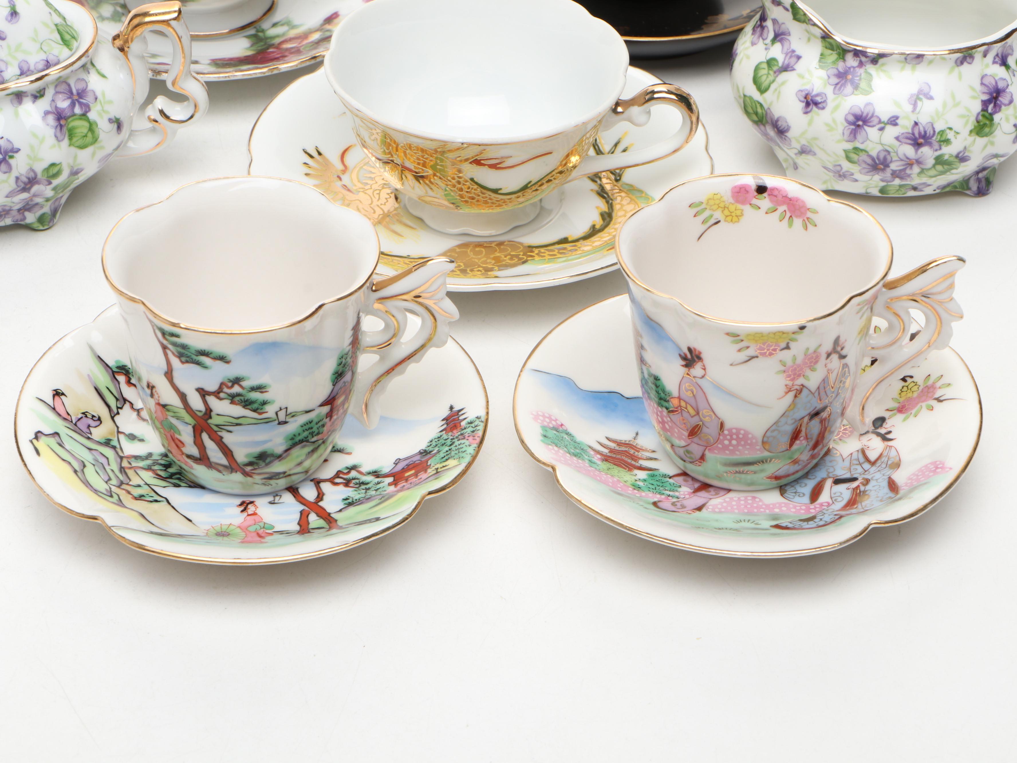 Hand Painted Delft Blue Porcelain Teacup and Saucer with More