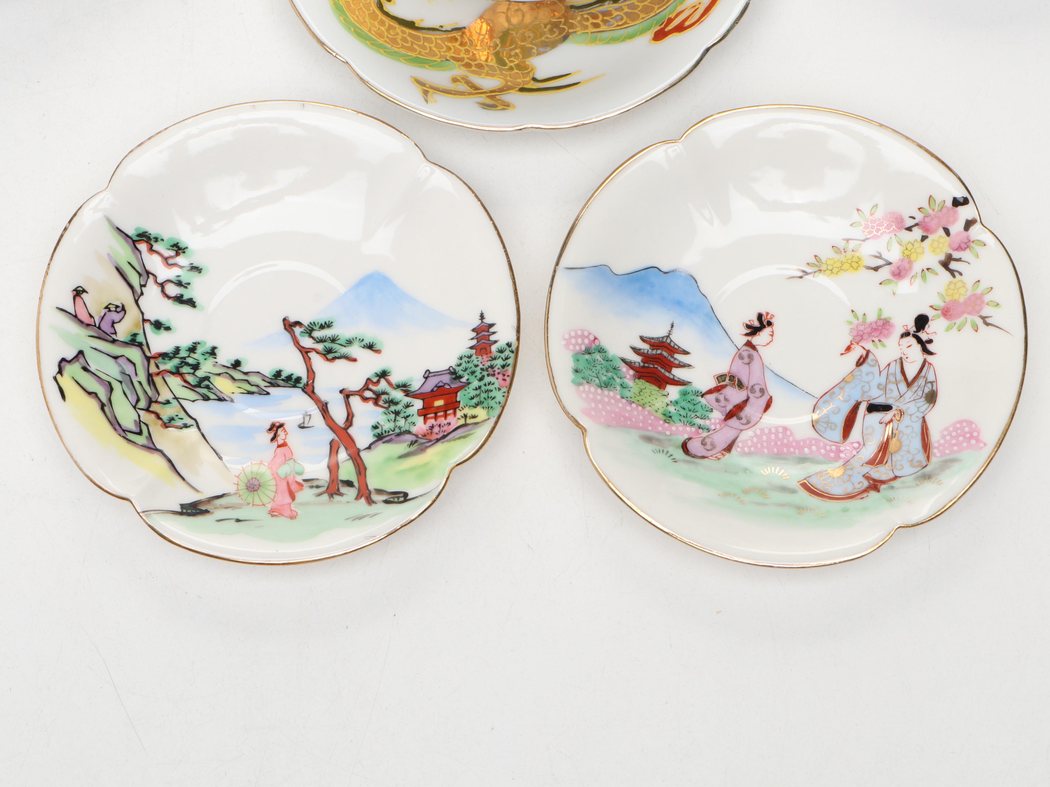 Hand Painted Delft Blue Porcelain Teacup and Saucer with More