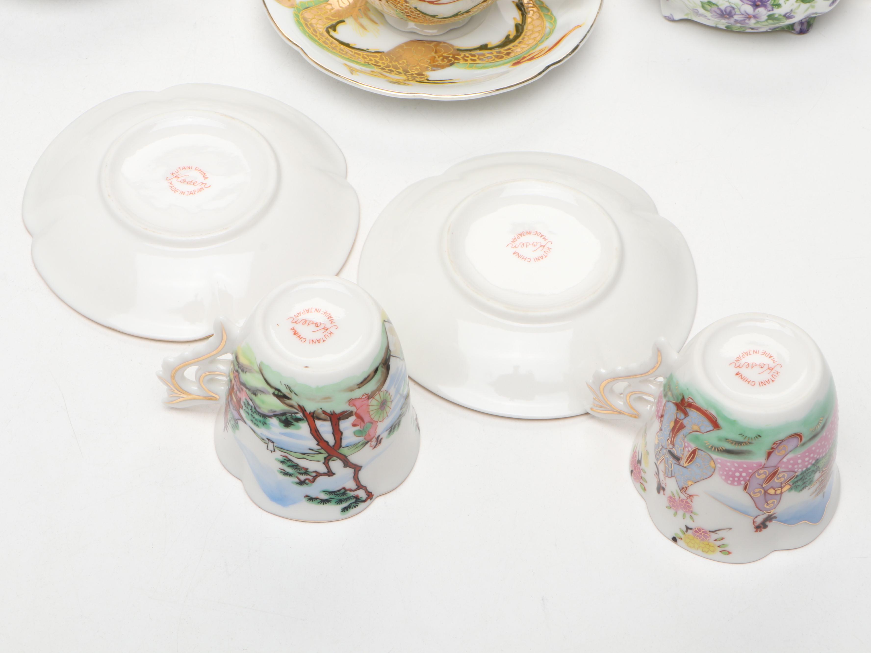 Hand Painted Delft Blue Porcelain Teacup and Saucer with More