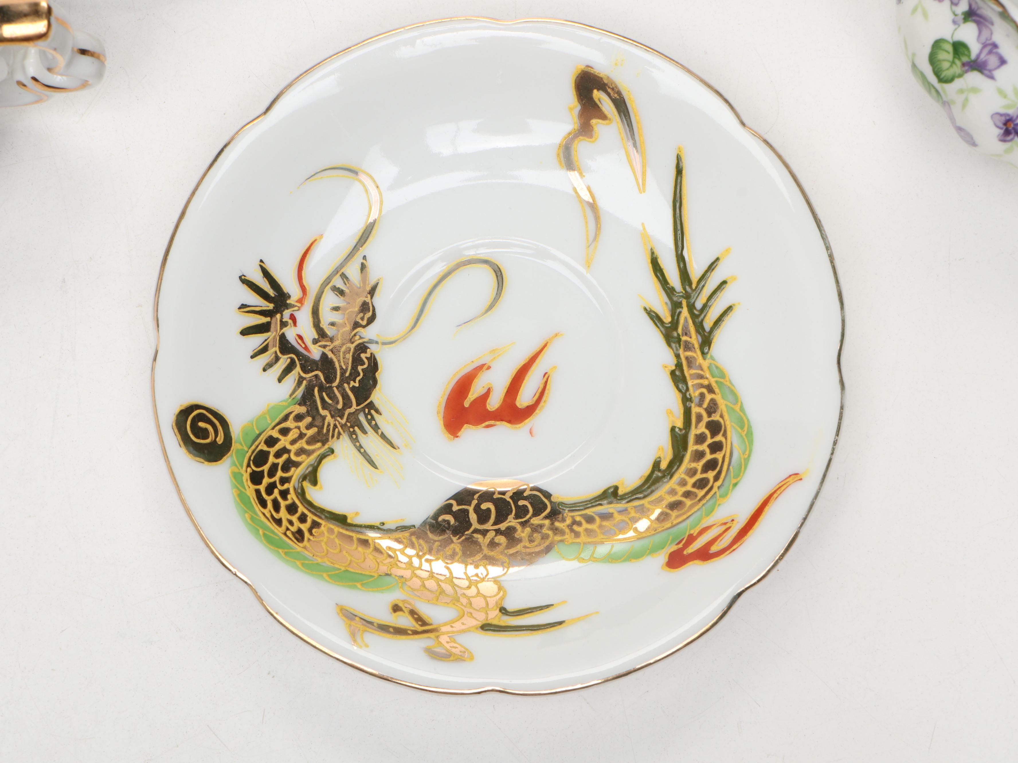 Hand Painted Delft Blue Porcelain Teacup and Saucer with More