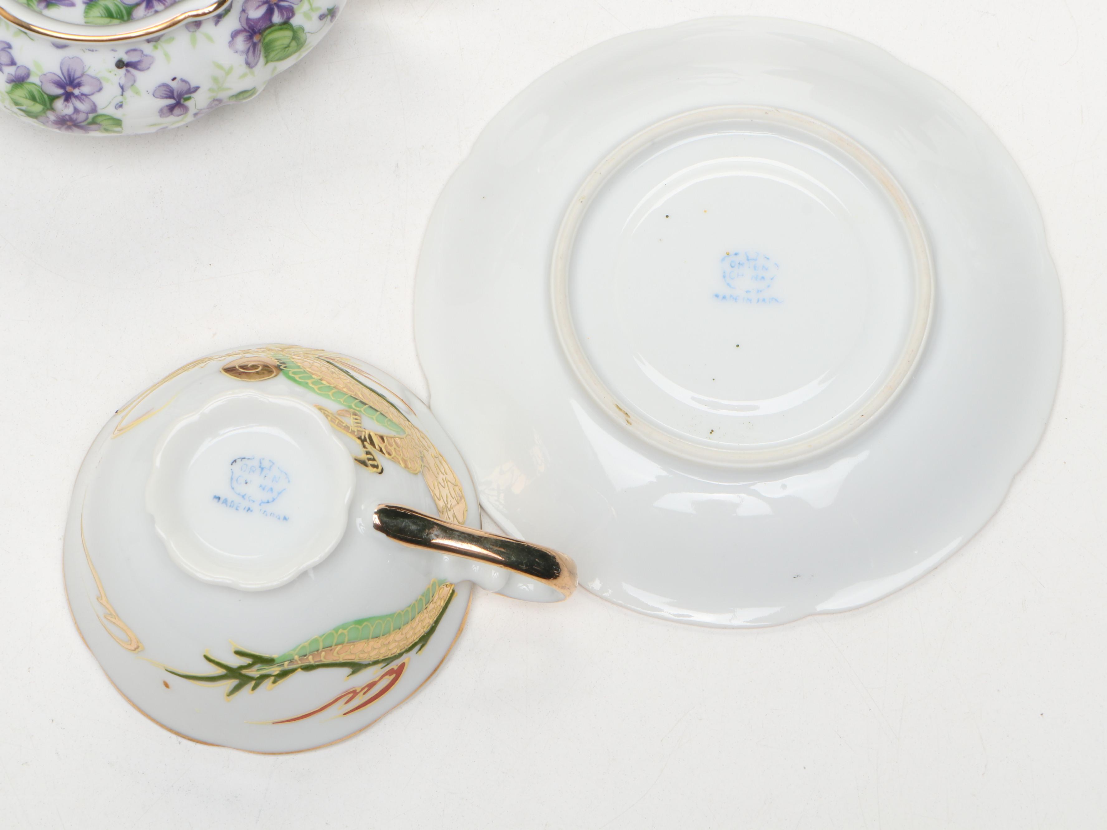 Hand Painted Delft Blue Porcelain Teacup and Saucer with More