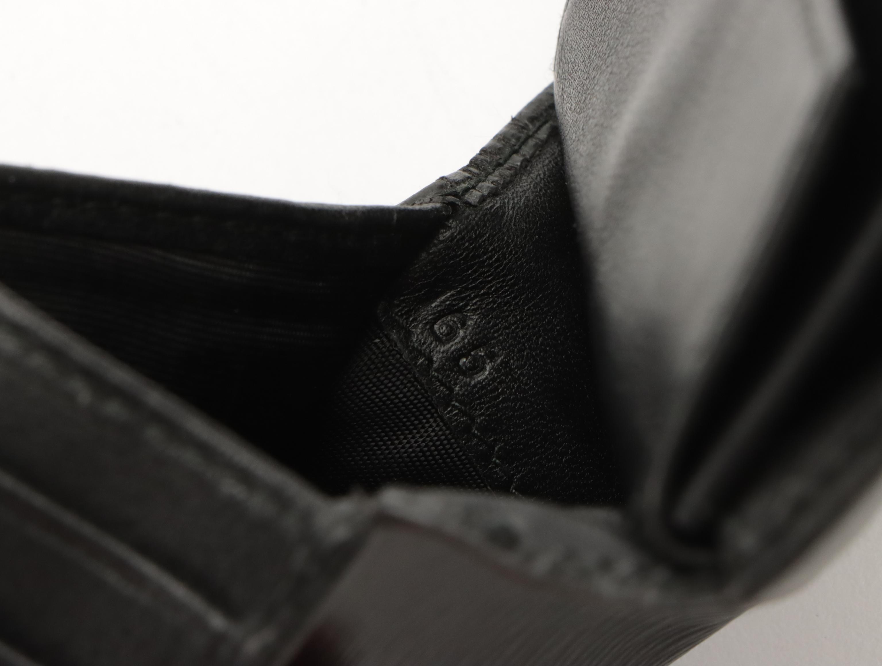 Prada Tri-Fold Compact Wallet in Black Textured Leather