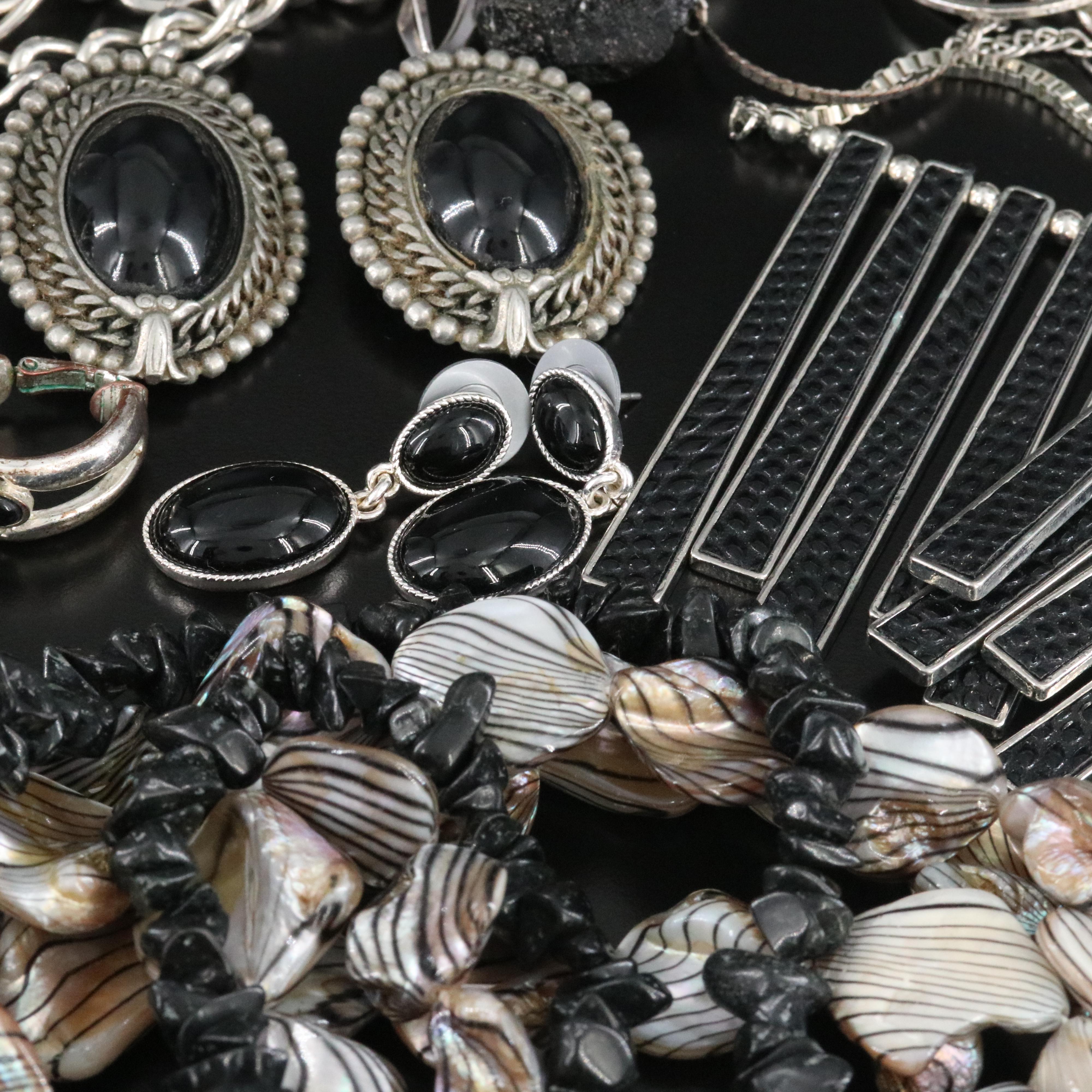 Monochromatic Jewelry Selection Featuring Sterling, Ceramic and Shell