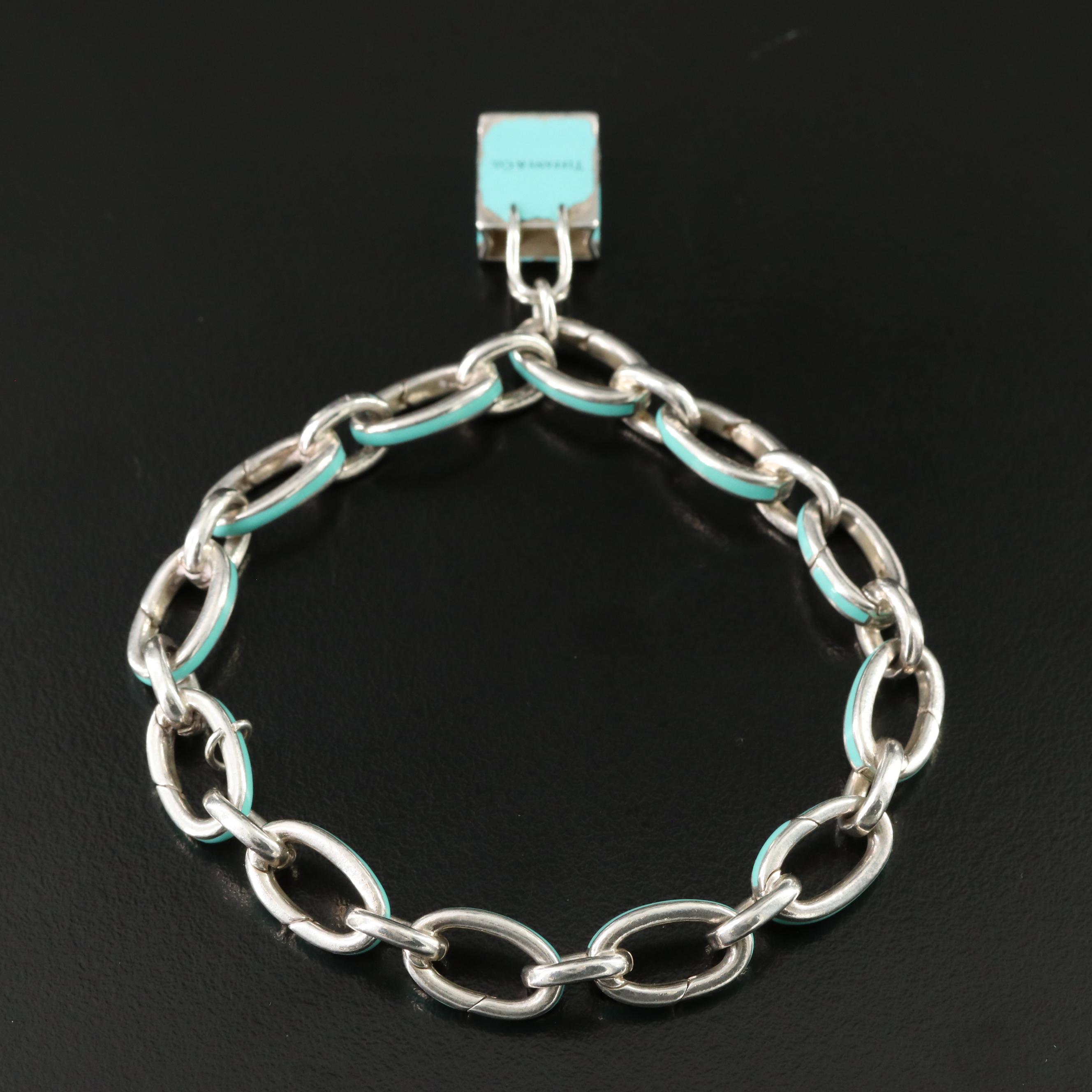Tiffany & Co. Sterling Blue Enamel Clasping Link Bracelet and Shopping Bag Charm