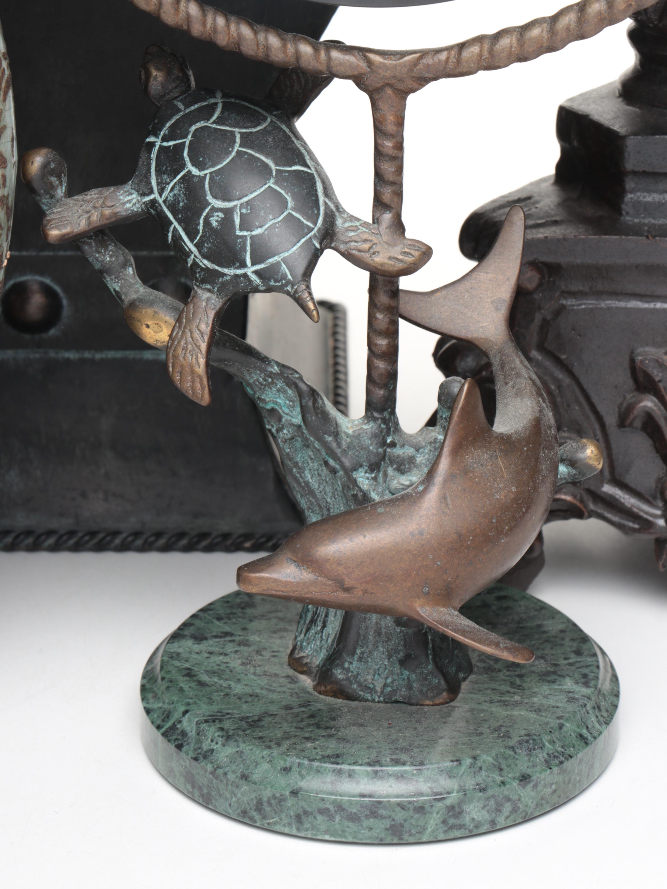 Pair of Footed Pillar Candle Holders with Decorative Vases and Mirror