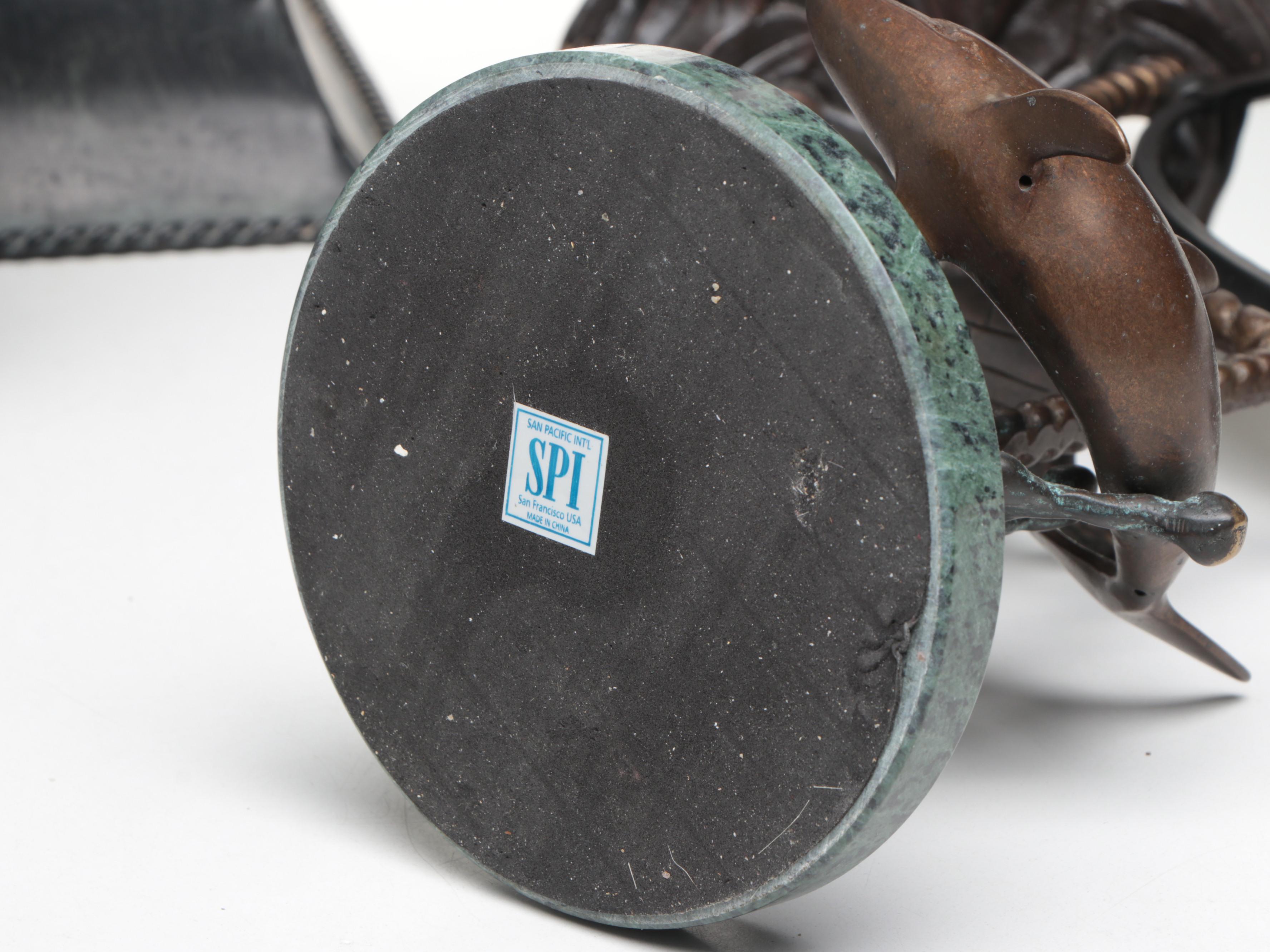 Pair of Footed Pillar Candle Holders with Decorative Vases and Mirror