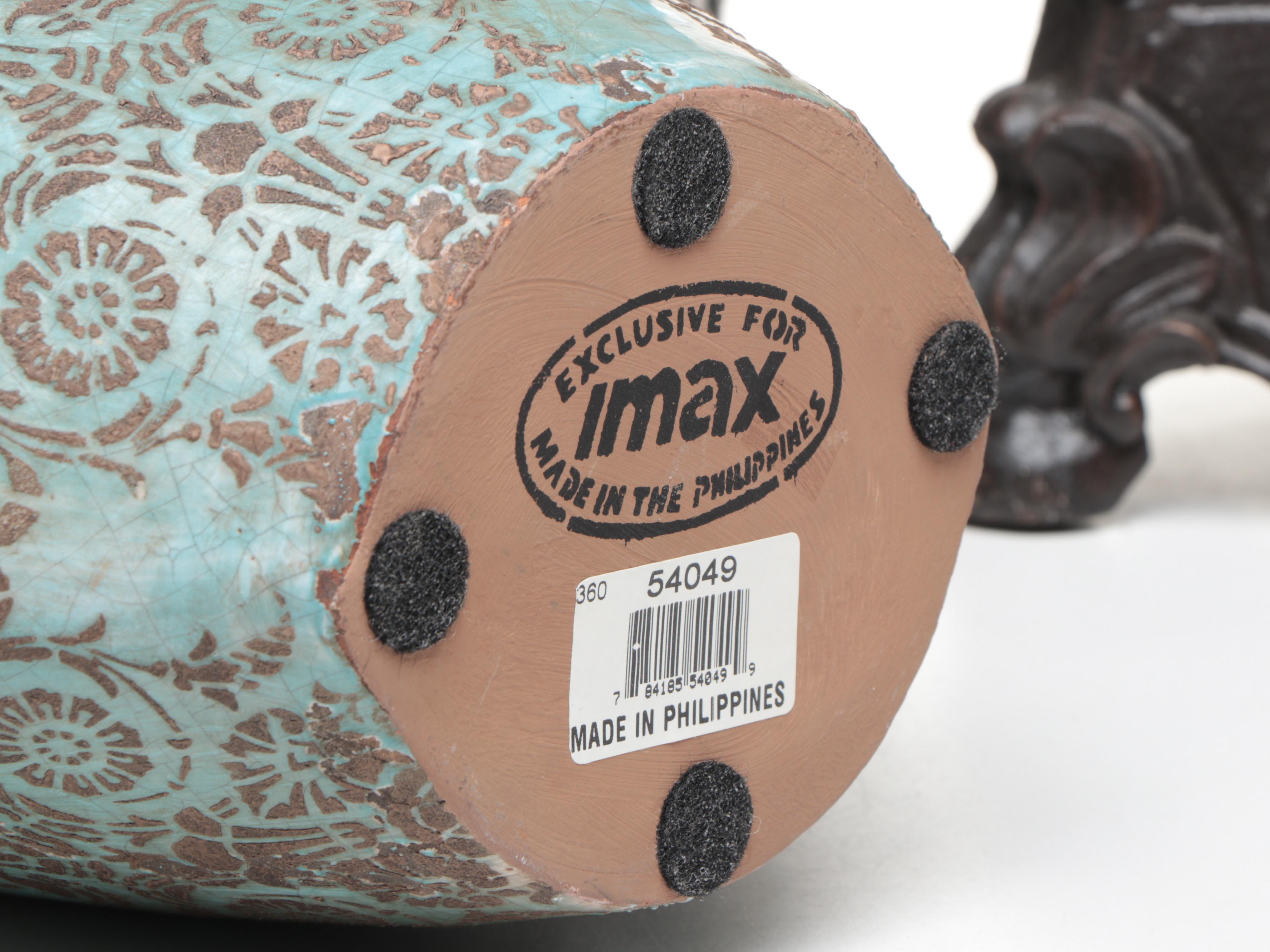 Pair of Footed Pillar Candle Holders with Decorative Vases and Mirror