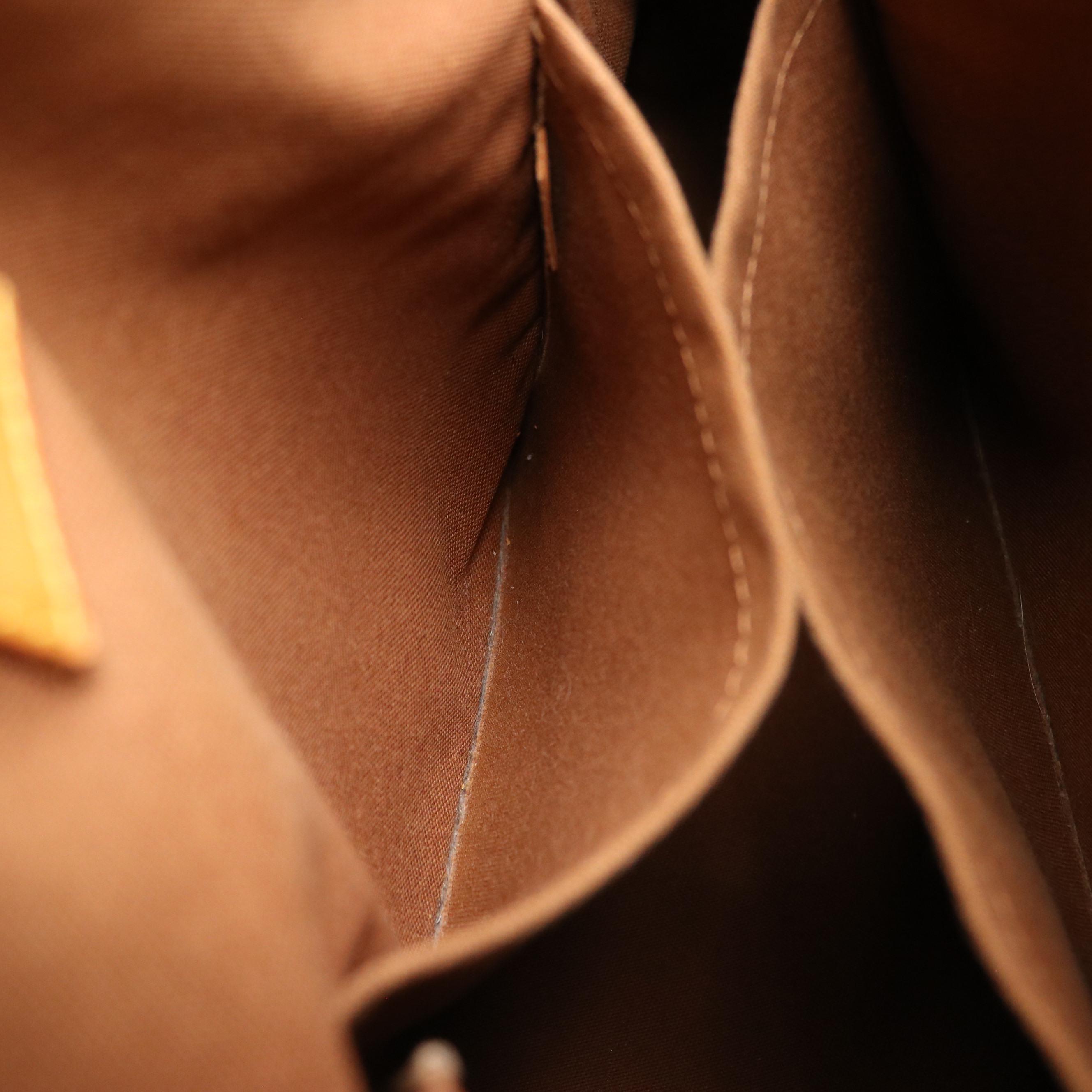 Louis Vuitton Tivoli GM Shoulder Bag in Monogram Coated Canvas and Leather