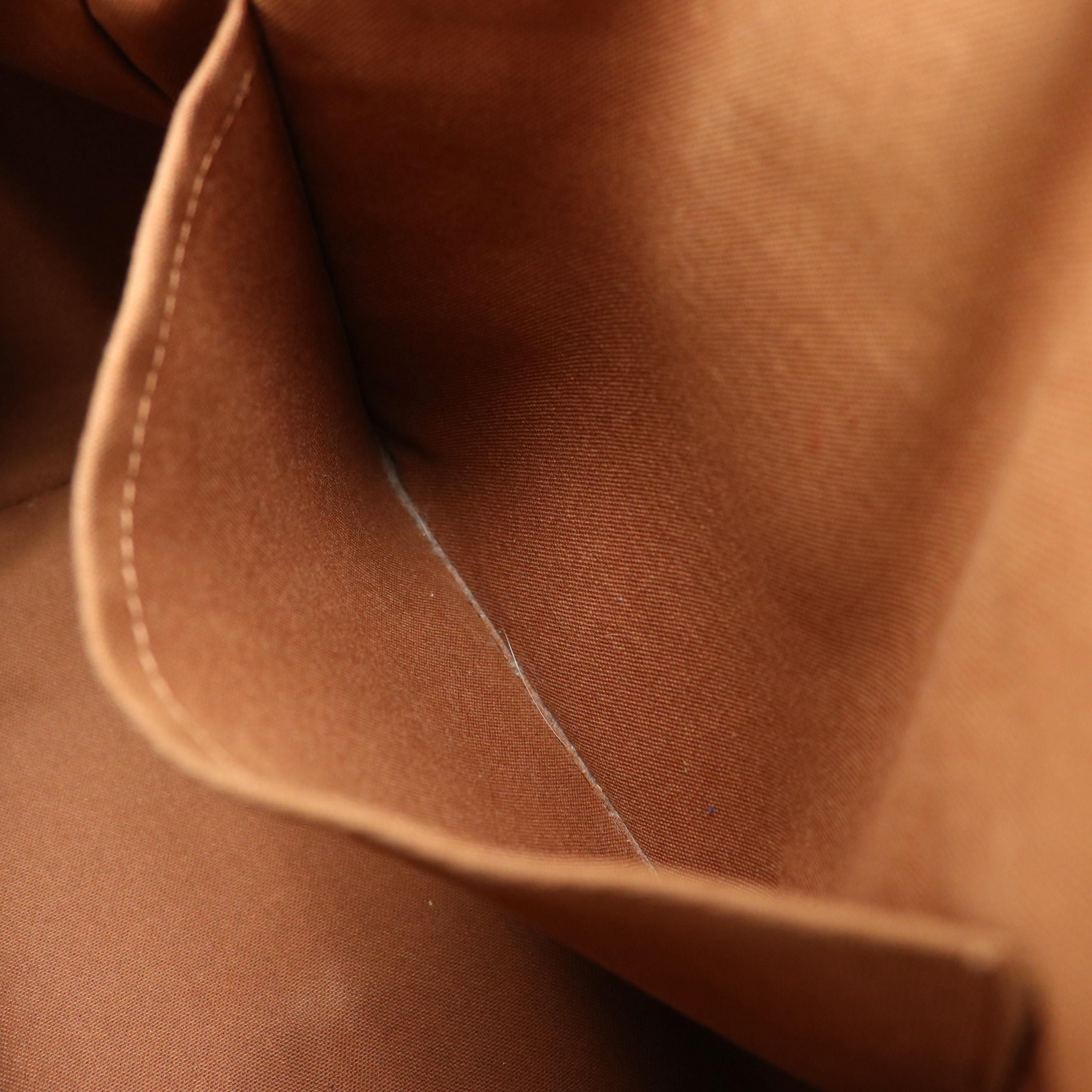 Louis Vuitton Tivoli GM Shoulder Bag in Monogram Coated Canvas and Leather