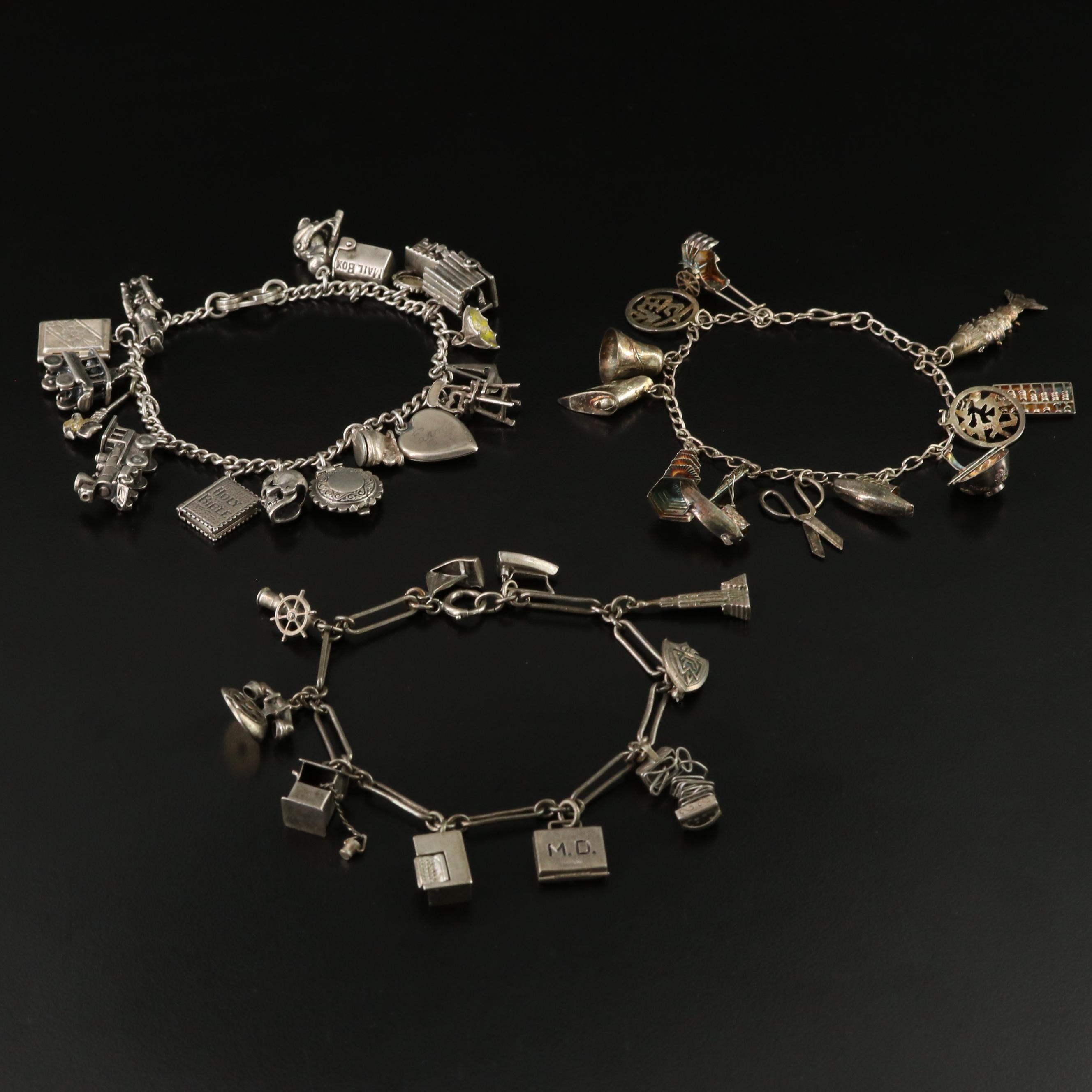 Vintage Charm Bracelets Featuring Sterling and Articulated Charms