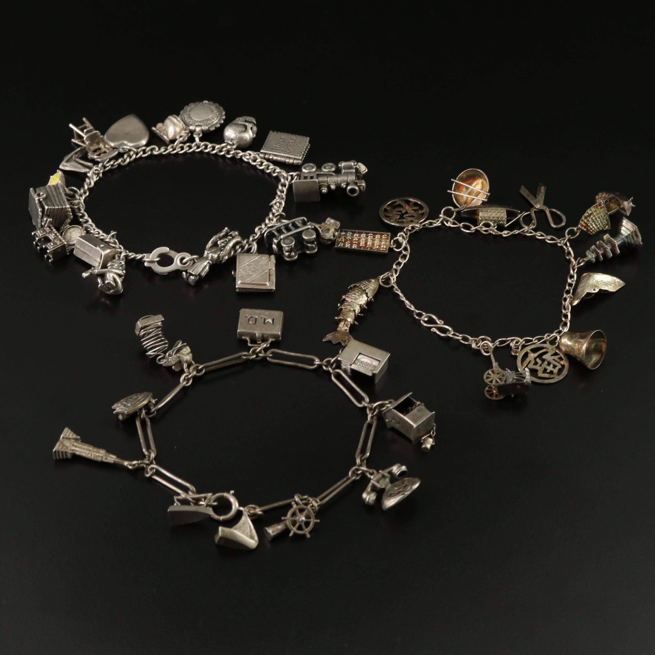 Vintage Charm Bracelets Featuring Sterling and Articulated Charms