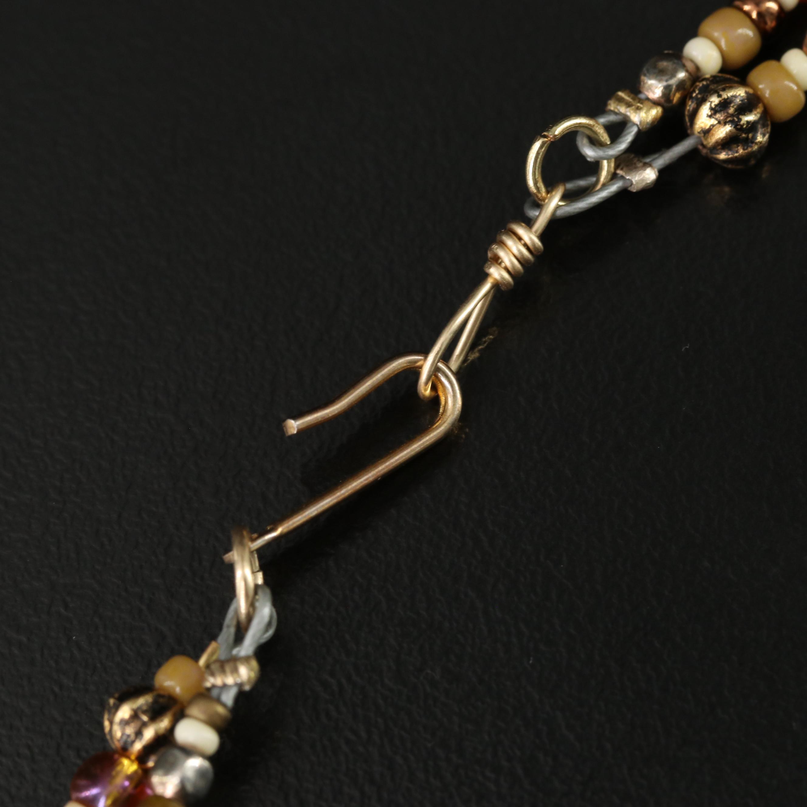 Bone and Tiger Iron Featured in Tiered Necklace