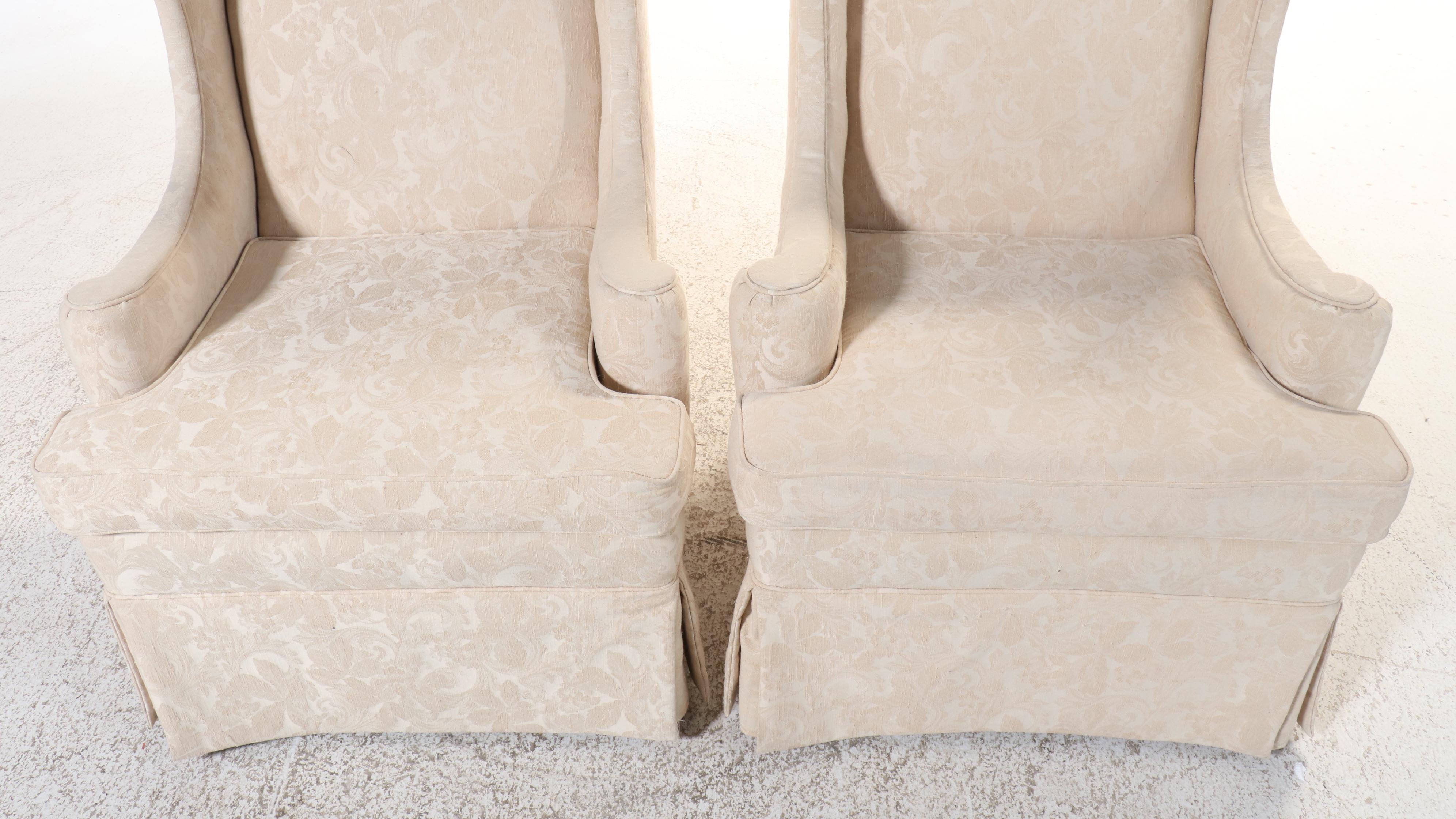 Pair of Ivory Damask Upholstered and Skirted Wingback Chairs